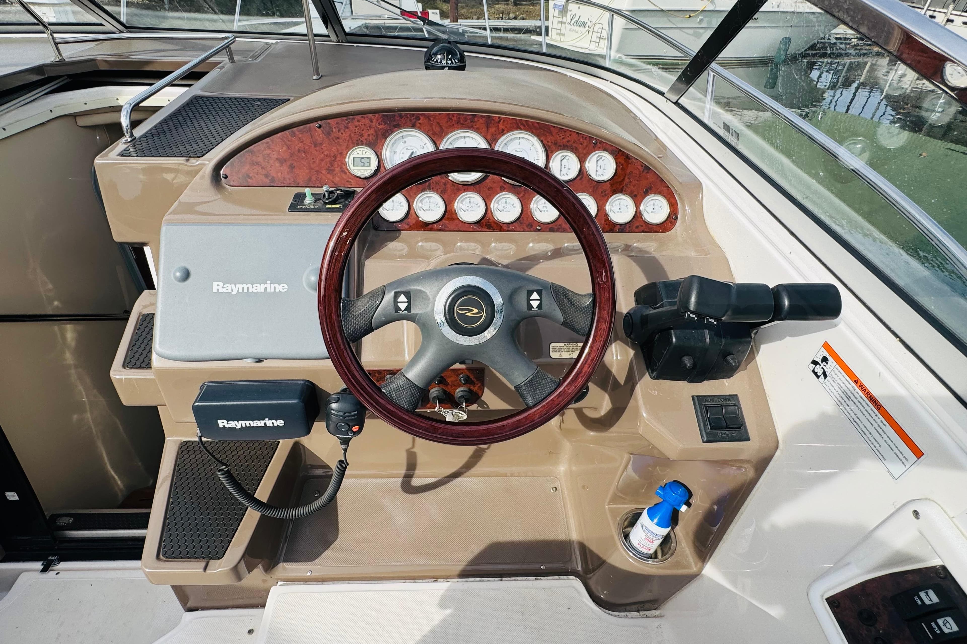 2006 Regal 3360 Window Express boat dashboard with Raymarine navigation system.