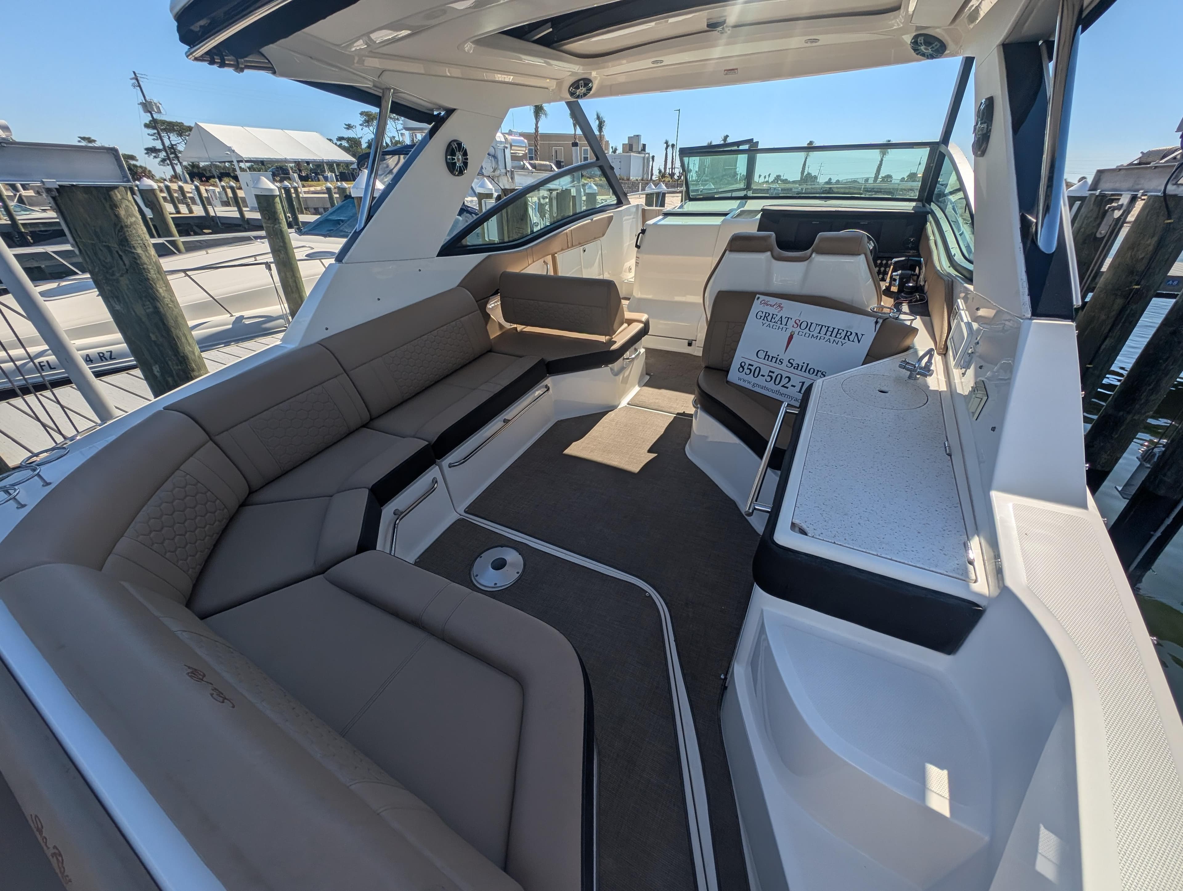 2019 Sea Ray Sundancer 320 interior with spacious seating and modern design.