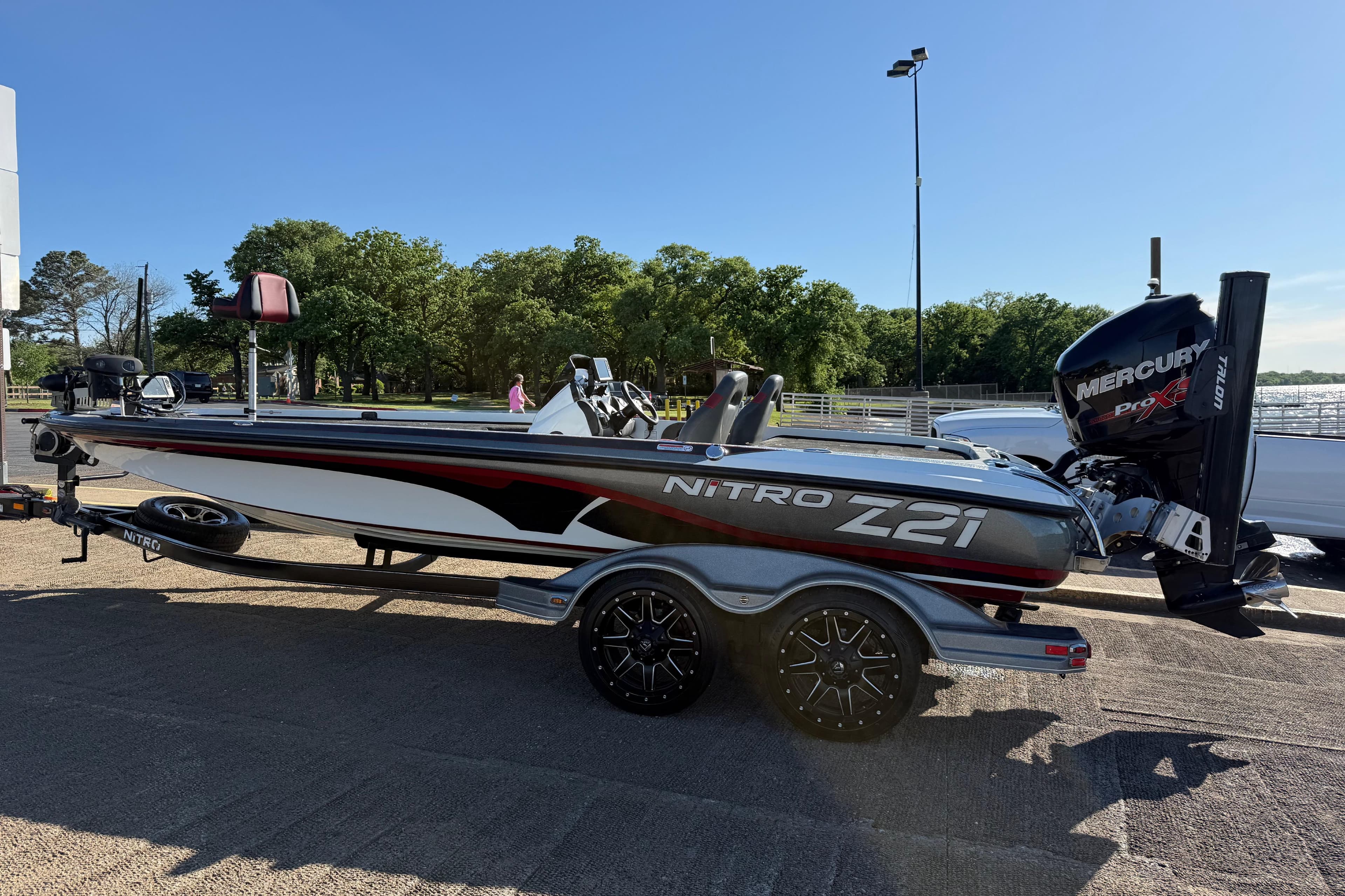 2016 Nitro Z21 boat with Mercury Pro XS engine on trailer, parked outdoors.