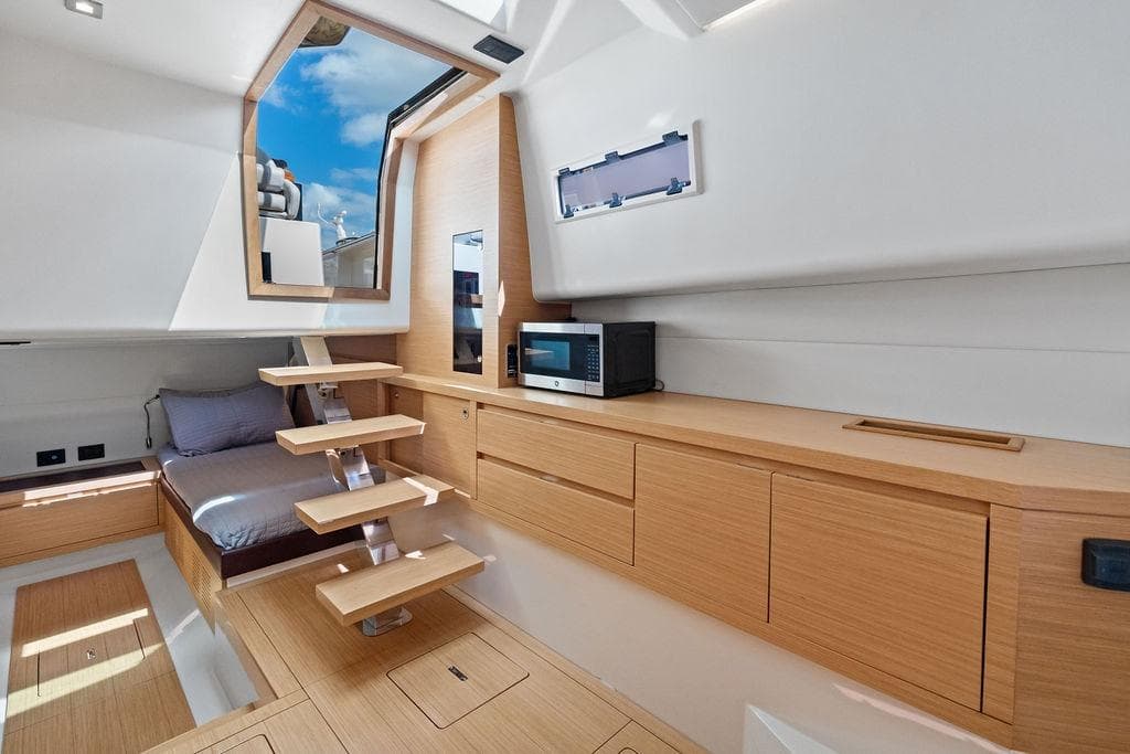 Modern interior of 2021 Pardo 43 yacht with wooden finishes and sleek design.