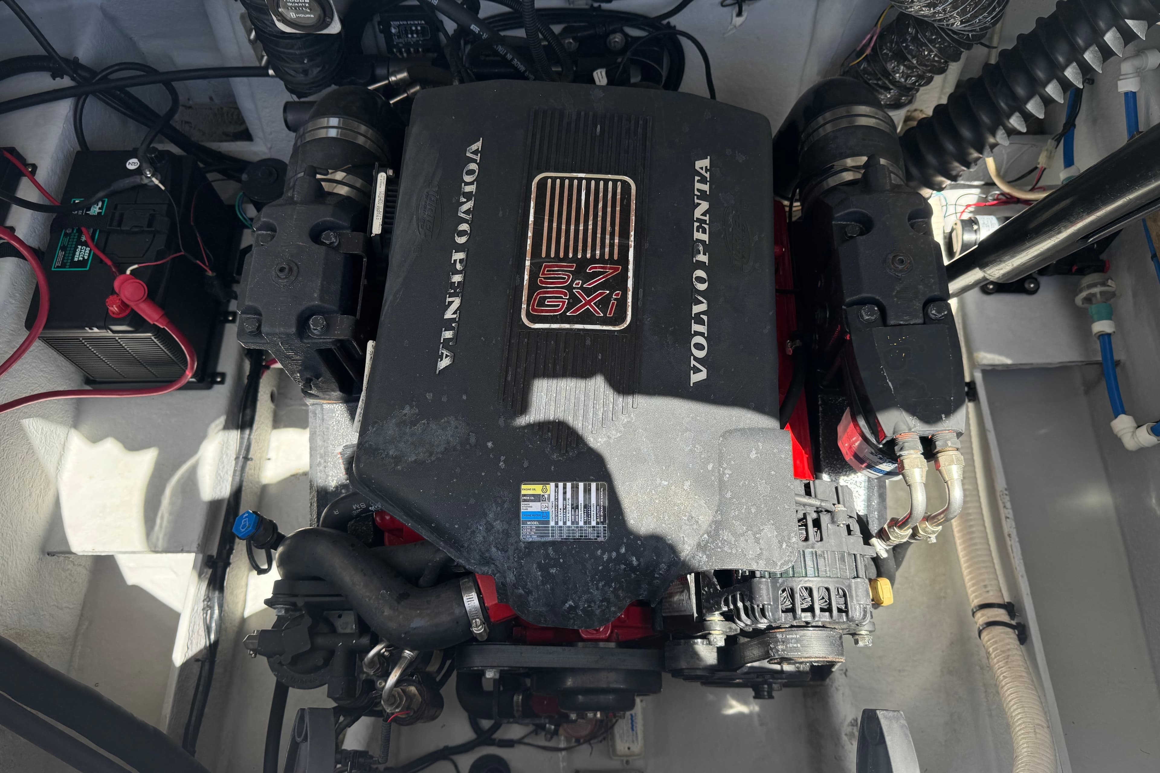 Engine compartment of a 2003 Four Winns 264 Funship with Volvo Penta 5.7 GXI engine.