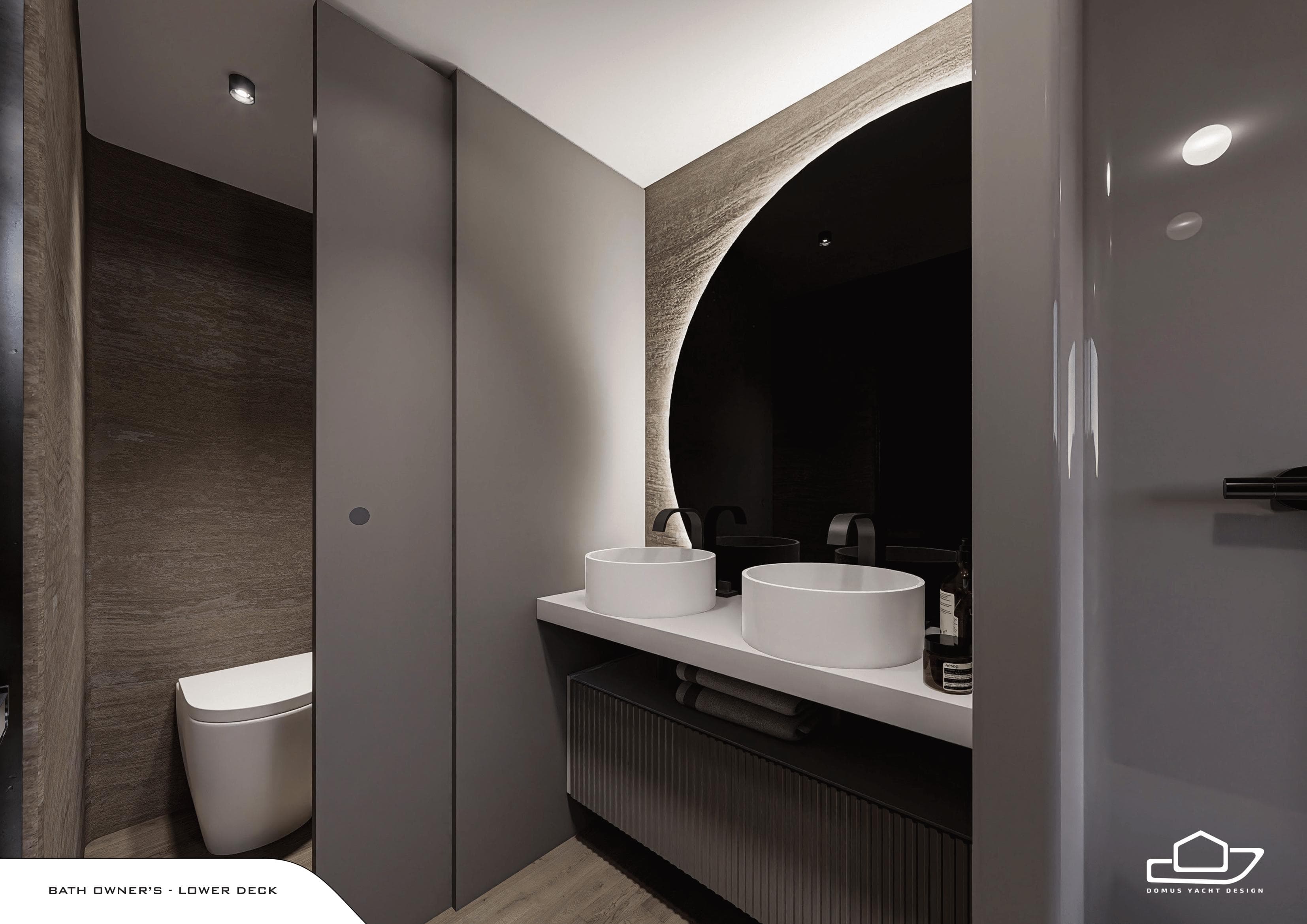 Luxurious yacht bathroom with dual sinks, modern design, and elegant lighting on the Domus 90.