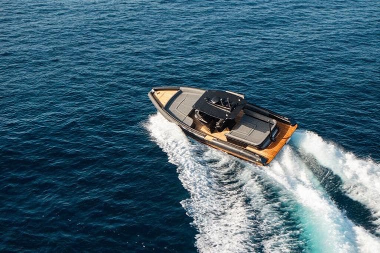 Novamarine Black Shiver 100 efb 2023 cruising on open sea, aerial view.