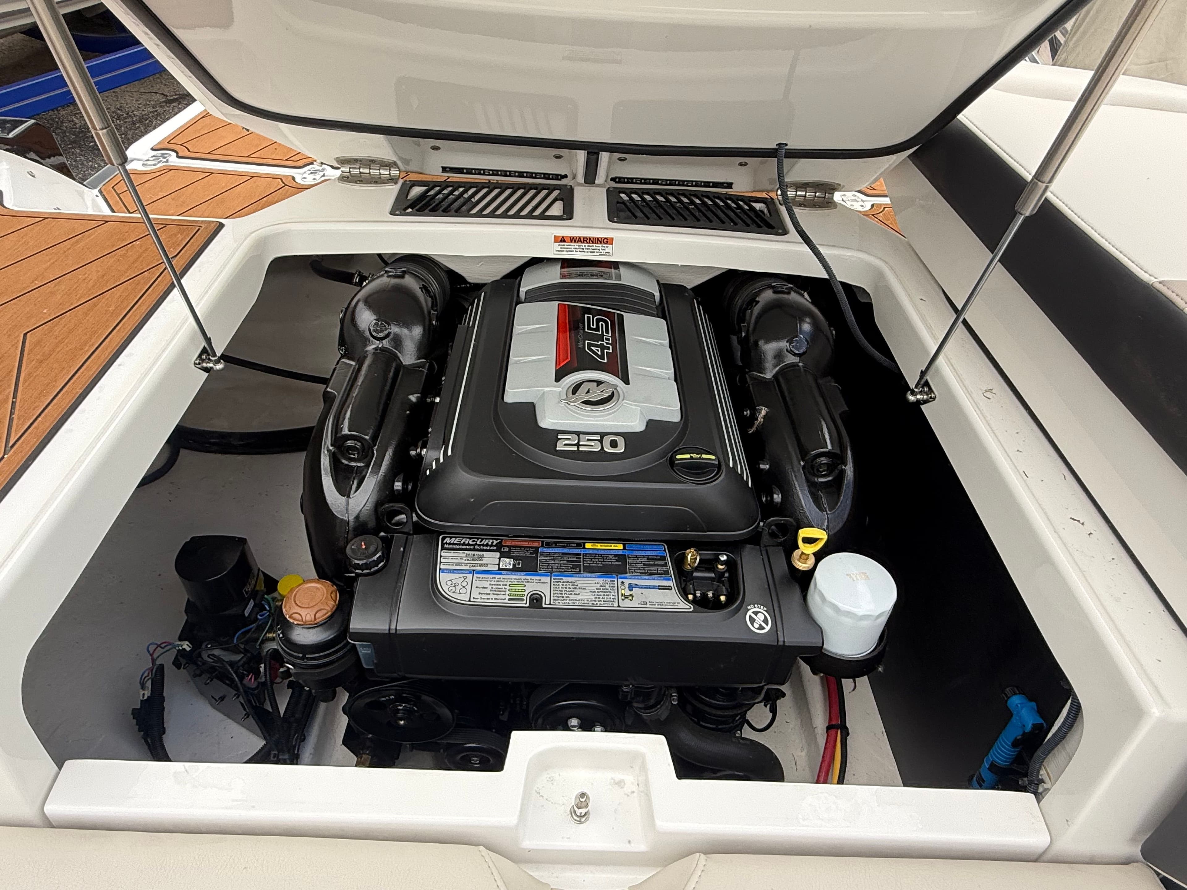 Engine compartment of 2021 Monterey 218 Super Sport with 250 HP engine.
