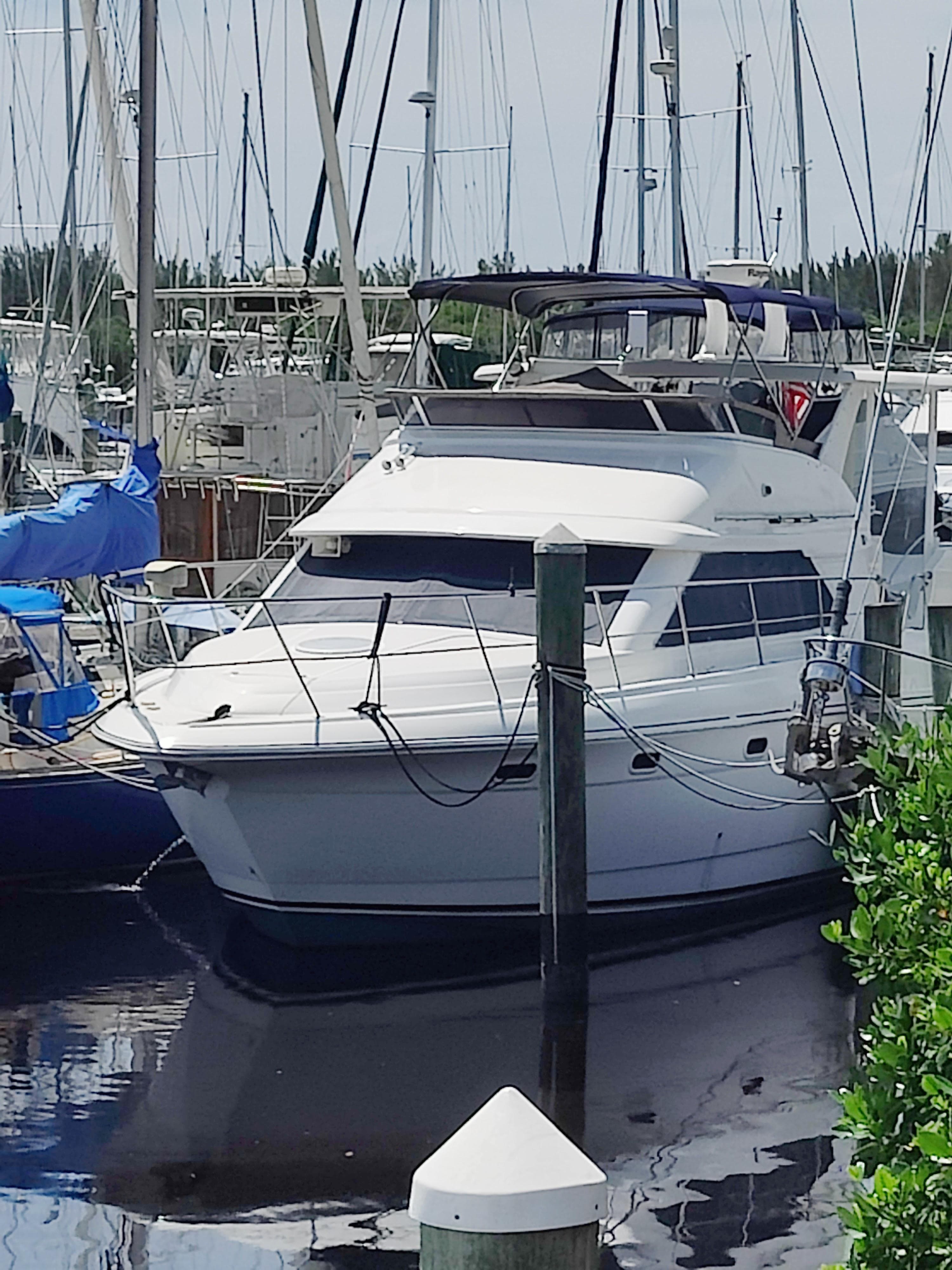 2001 Cruisers Yachts 3750 Motoryacht docked in marina.