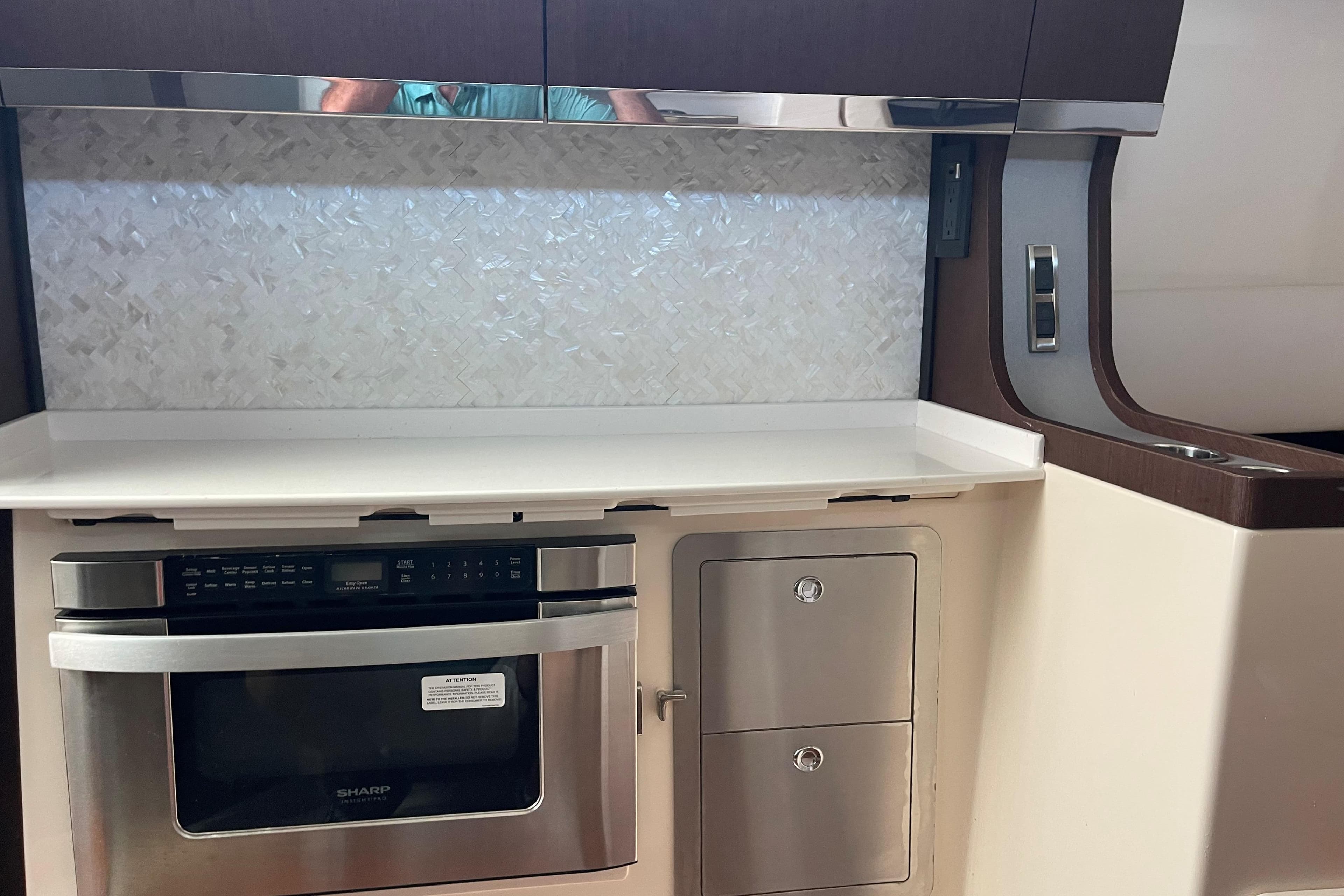 2022 Grady-White Canyon 456 interior kitchen with modern appliances and sleek design.