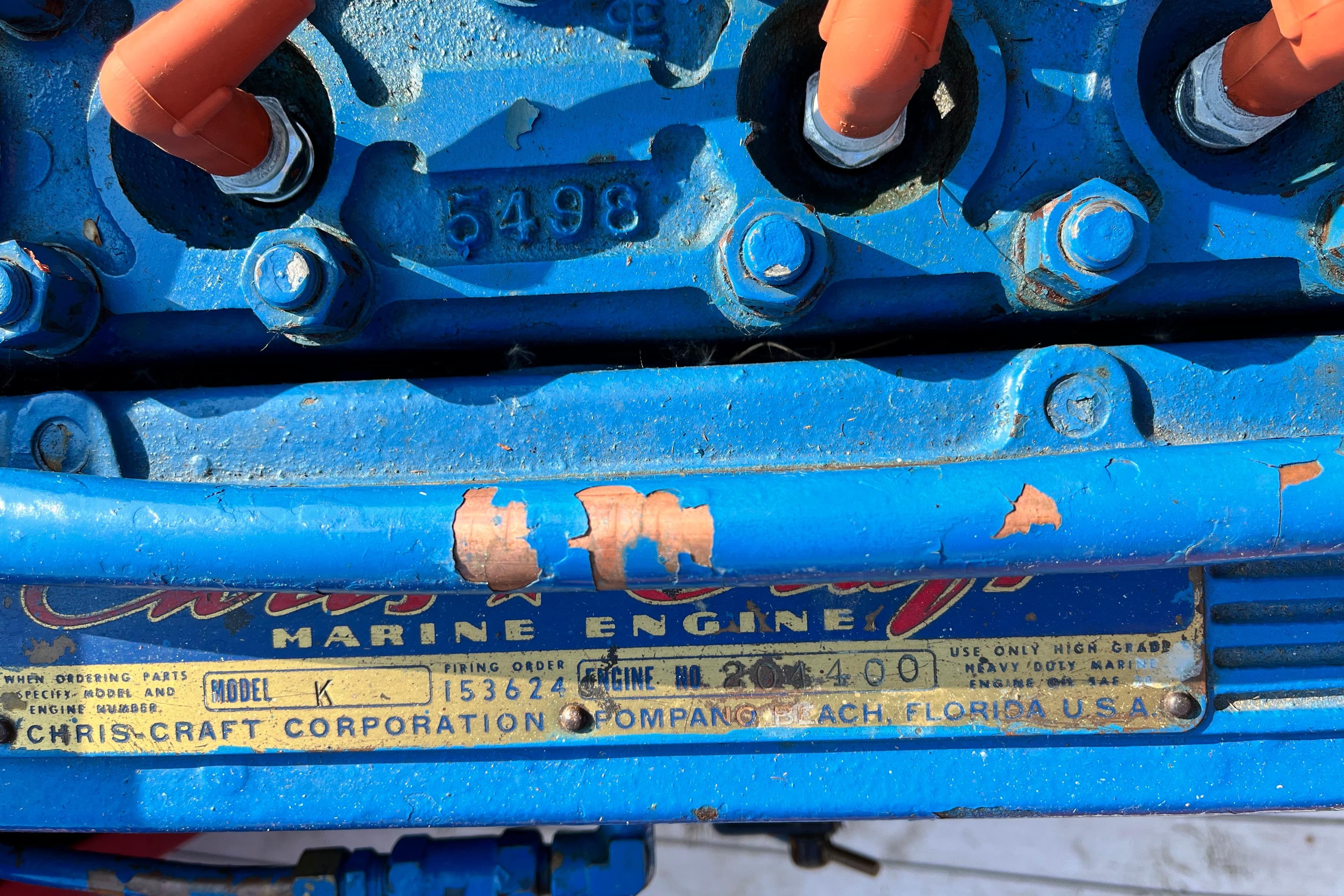 1958 Chris-Craft 16 Cavalier marine engine with blue paint and visible model plate.