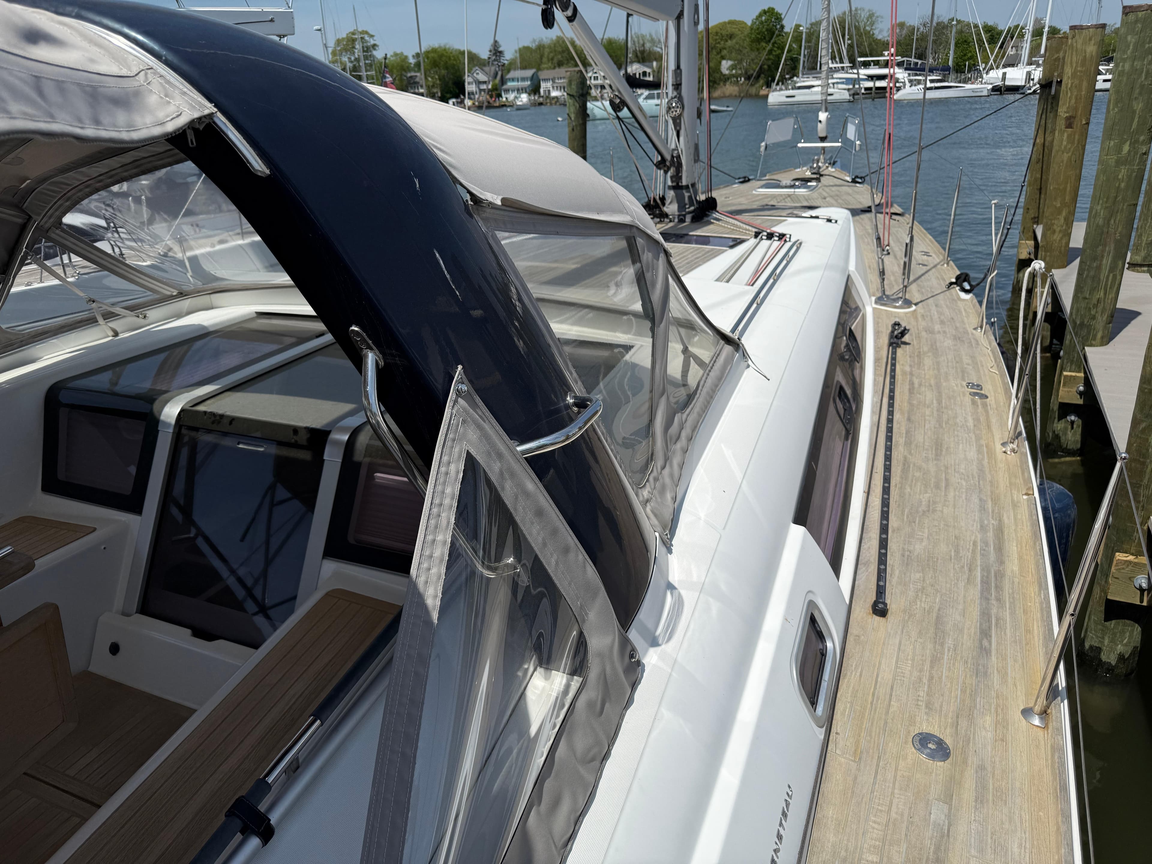 2016 Beneteau Oceanis 60 yacht docked, showcasing sleek deck and cockpit design.