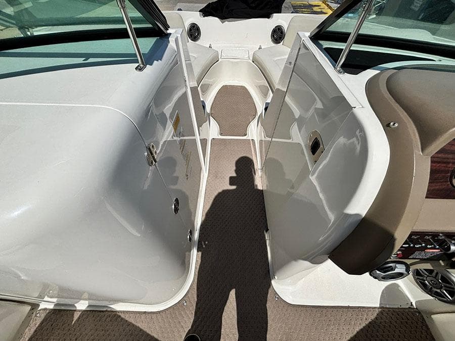 2013 Sea Ray 240 Sundeck interior, featuring spacious seating and modern design elements.