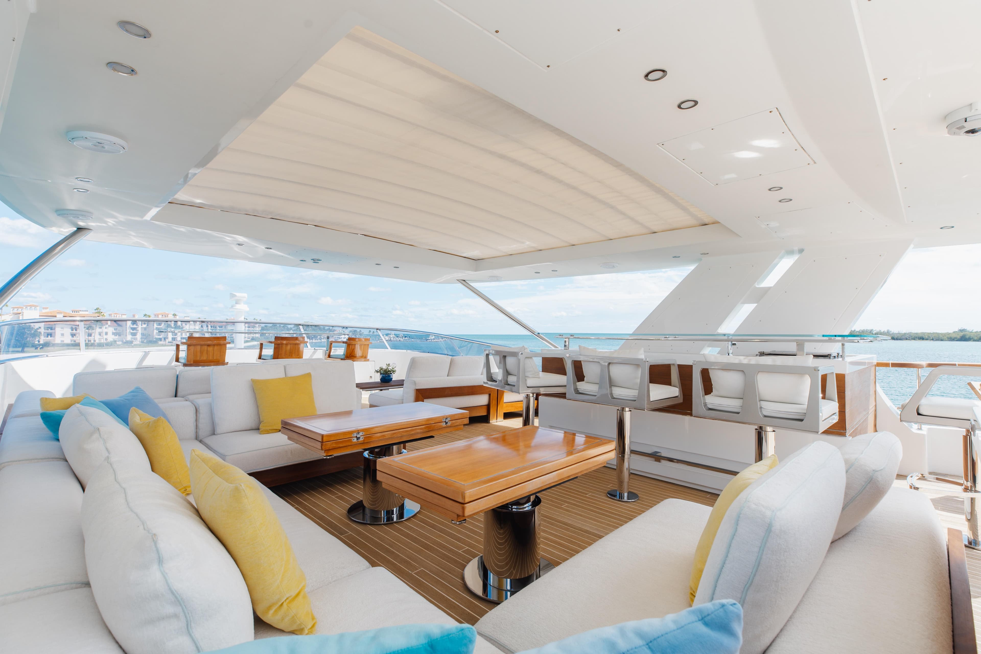 Luxurious 2018 Benetti Fast 125 yacht deck with elegant seating and ocean view.