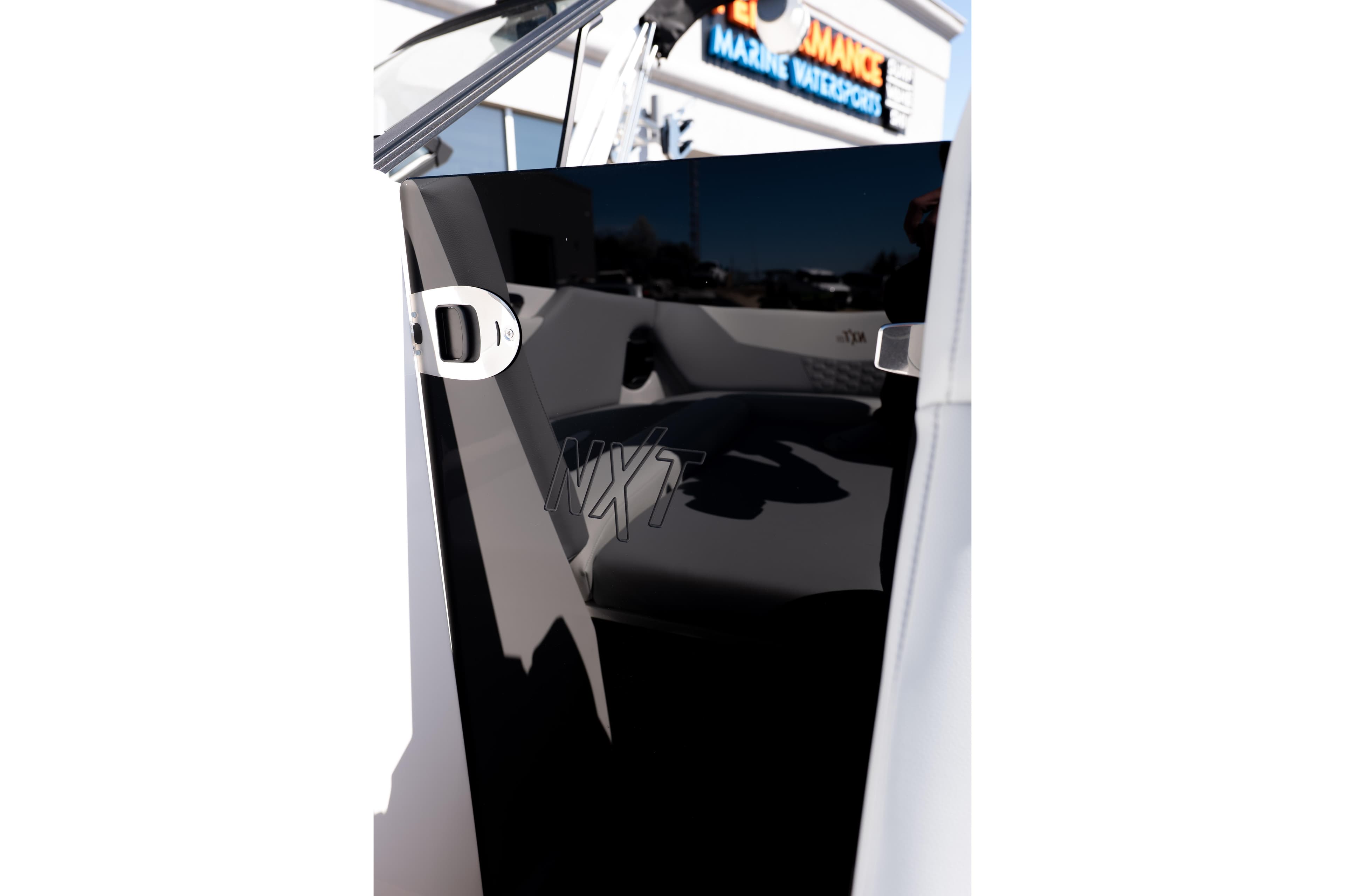 2026 MasterCraft NXT24 boat interior with sleek black panel and modern design.