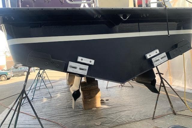 2013 Coastal Craft 45 boat hull on stands in a workshop.