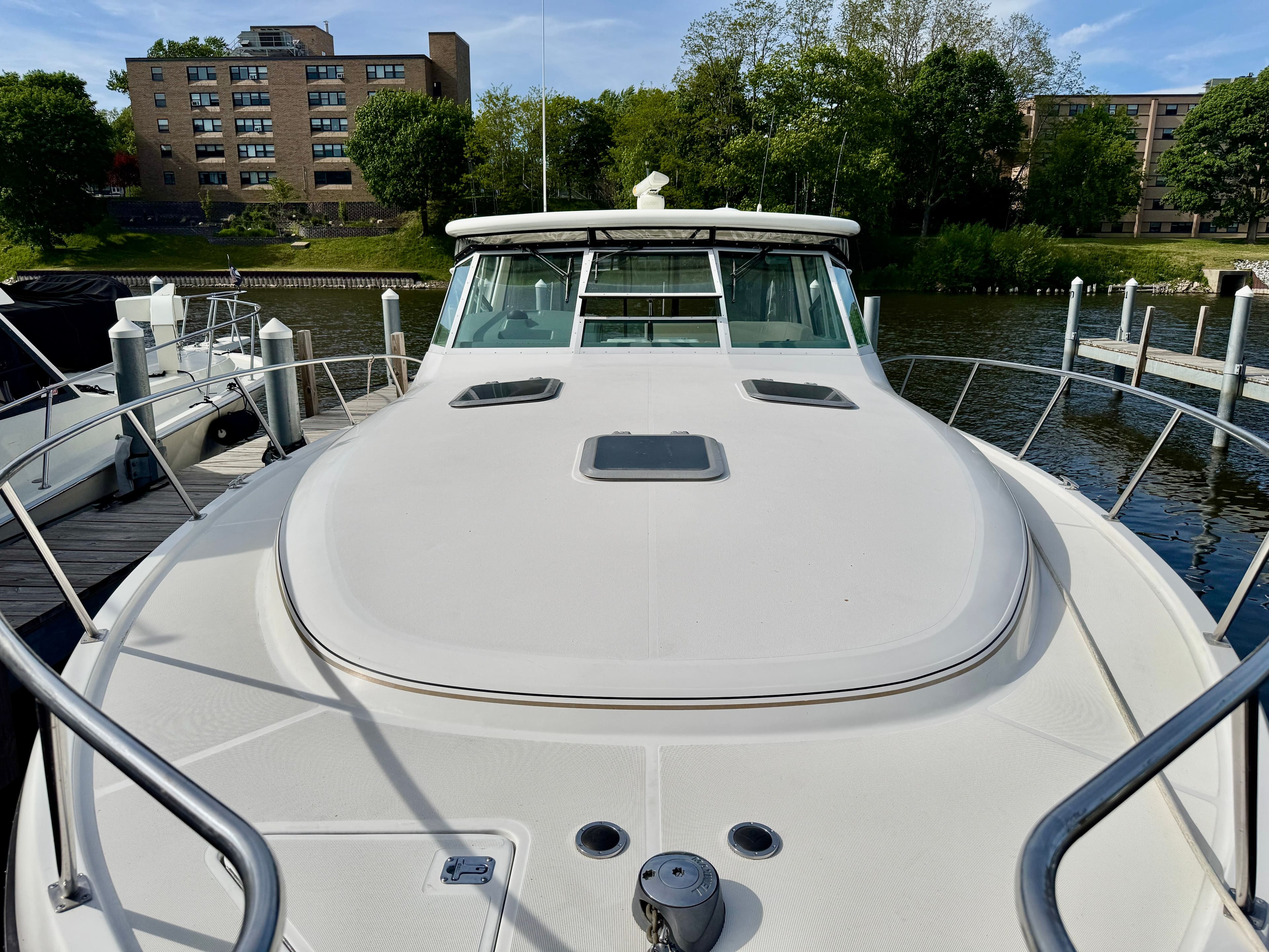 1999 Tiara Yachts 4100 Open at dock, front view.