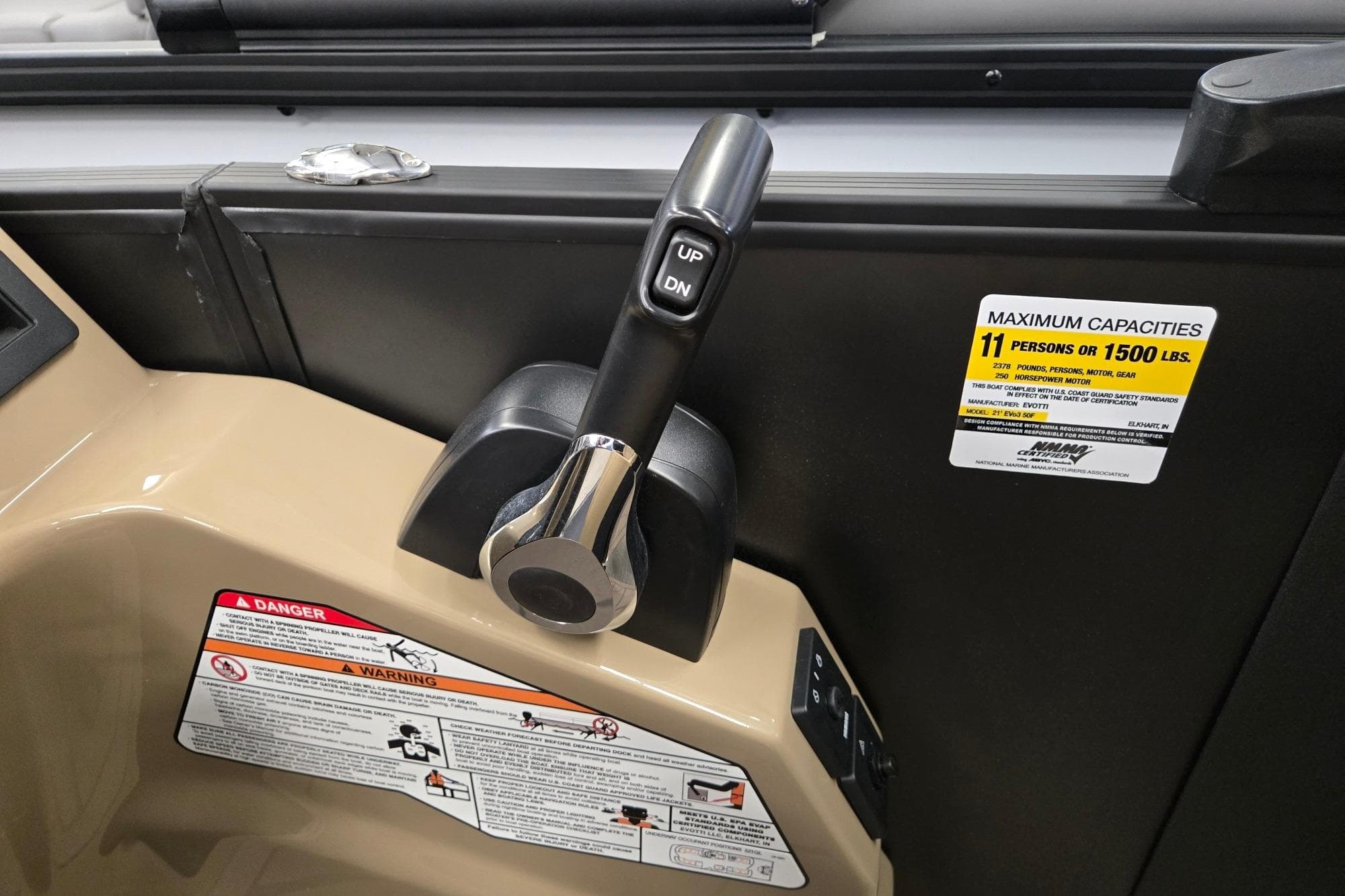 Throttle control and capacity label on 2026 Evotti 521QL boat dashboard.