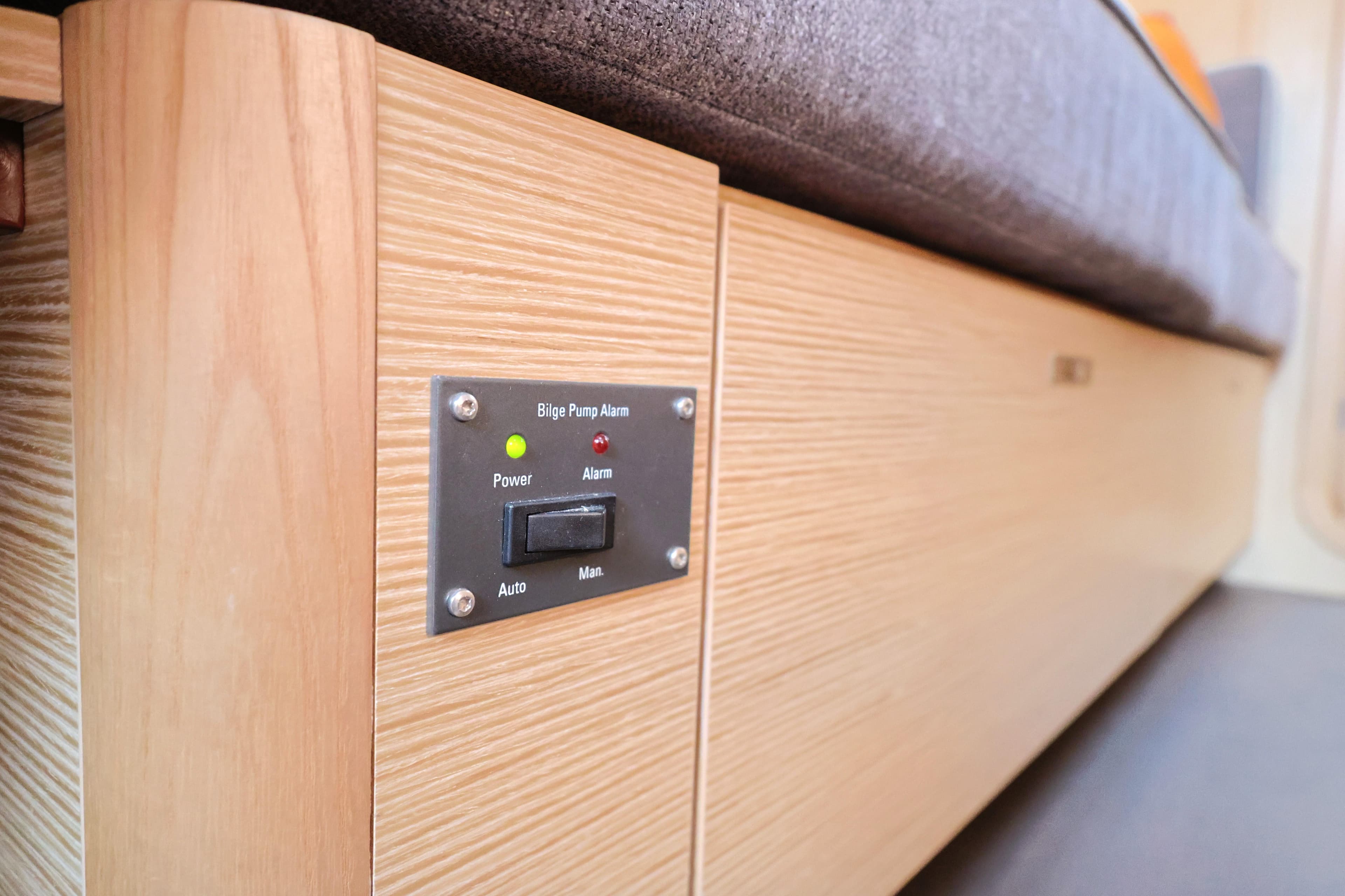 Bilge pump alarm panel on 2021 Dehler 42 yacht interior.