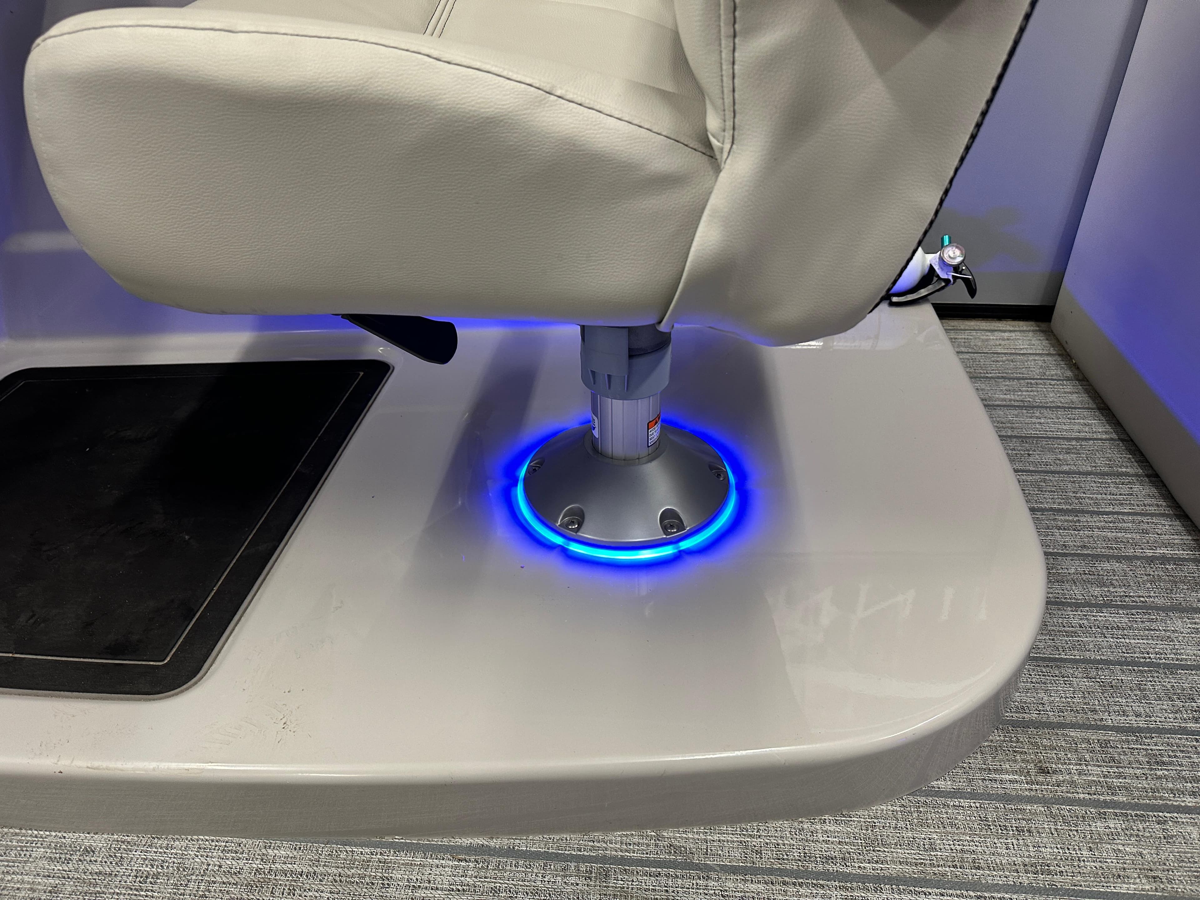2022 Starcraft SLS 3 seat with illuminated base on a boat deck.