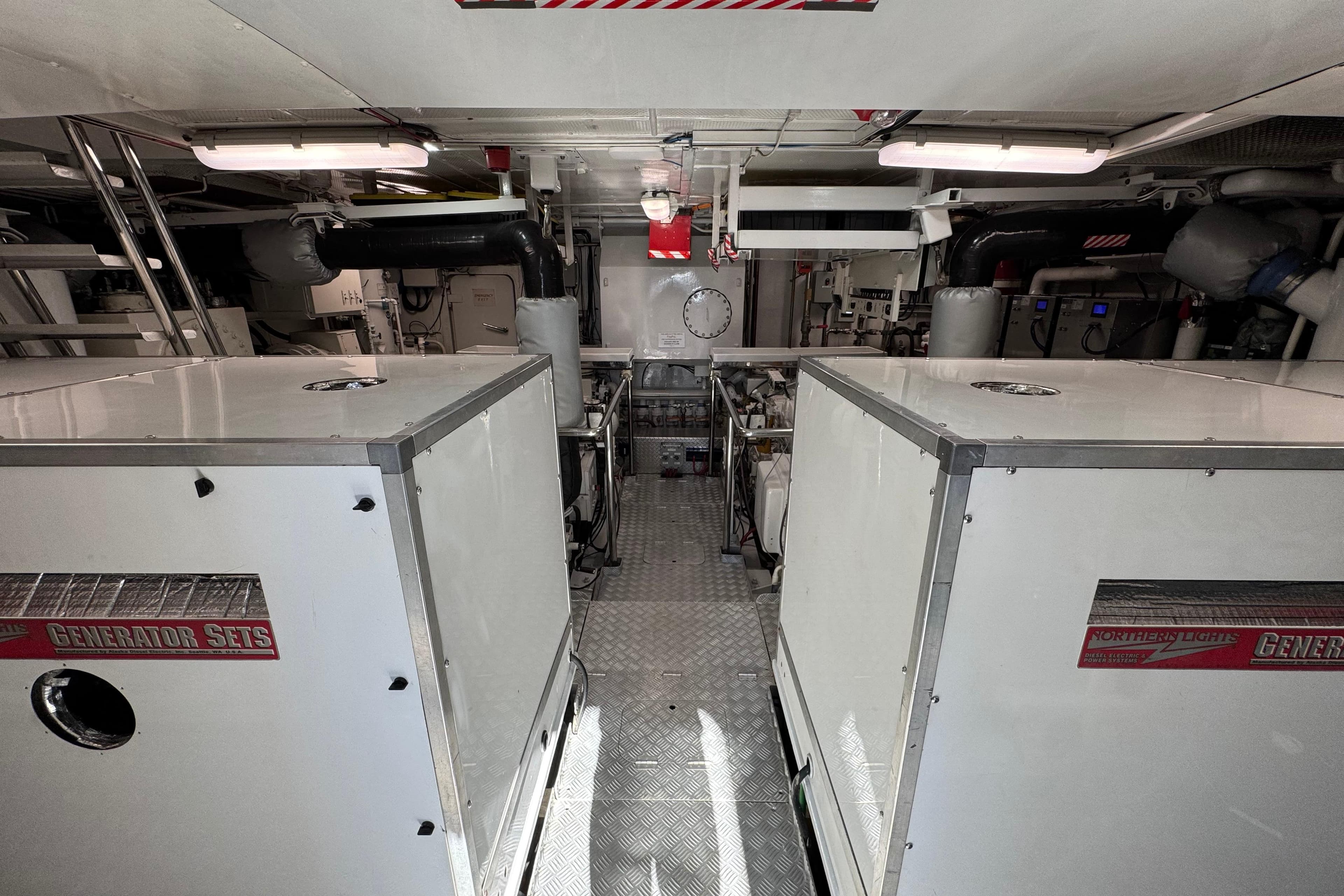 Engine room of a 2001 Doogersbank Vipack with generator sets and industrial equipment.