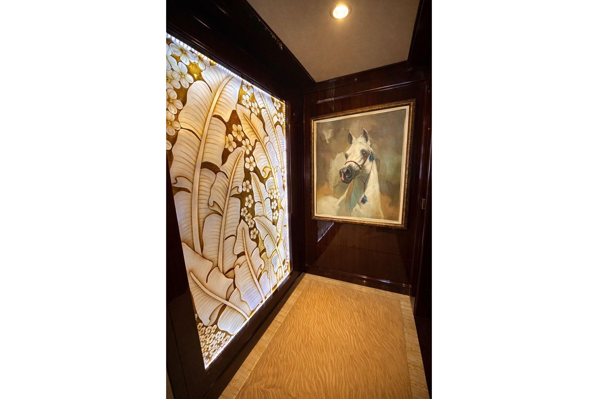 Luxurious interior with horse painting and decorative floral panel, Riviera 2010 design.