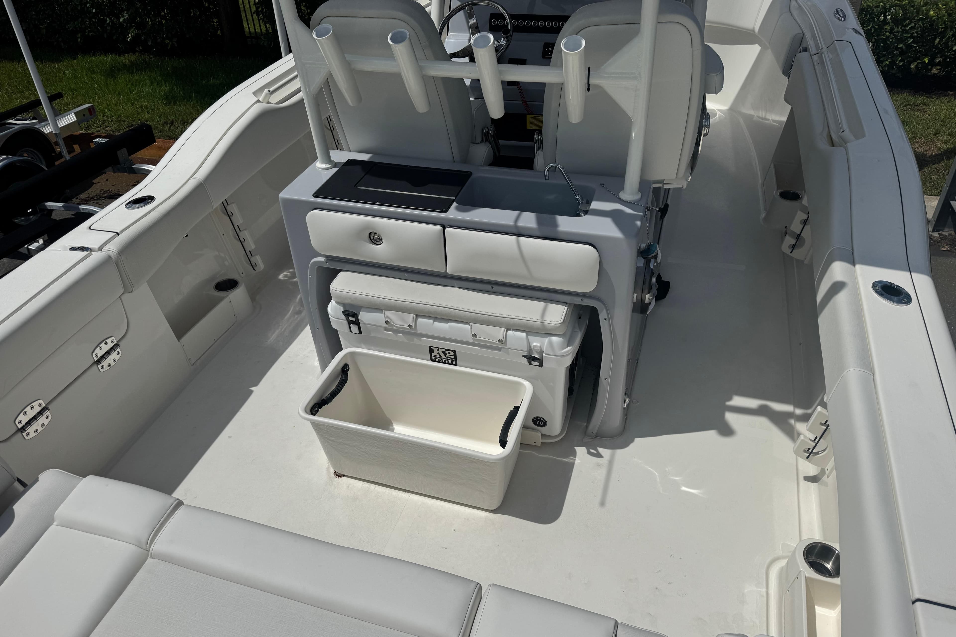 2025 Key West 263 FS boat interior with seating and storage compartments.