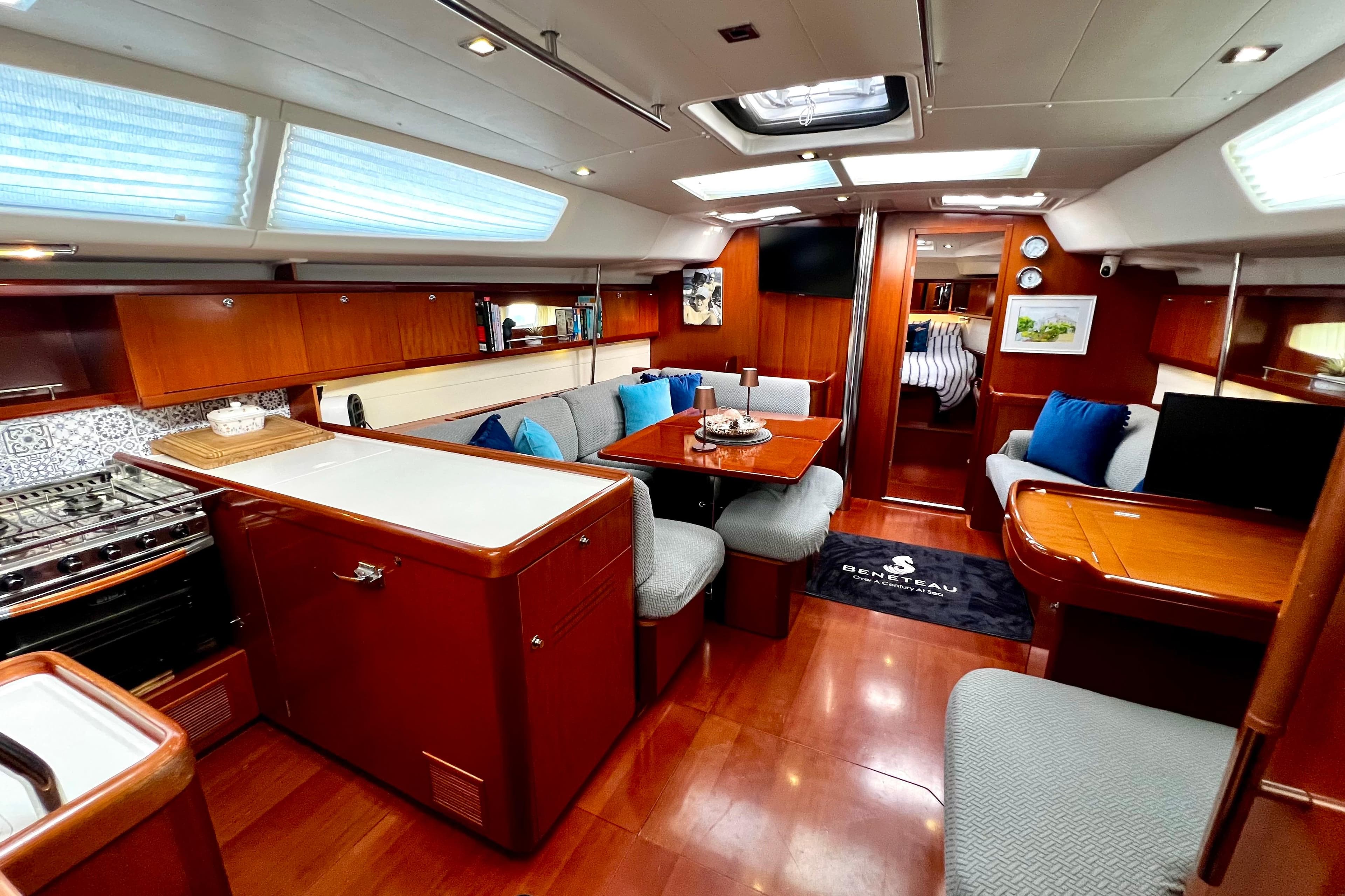 Luxurious 2006 Beneteau Oceanis 50 yacht interior with elegant wood finish and modern amenities.