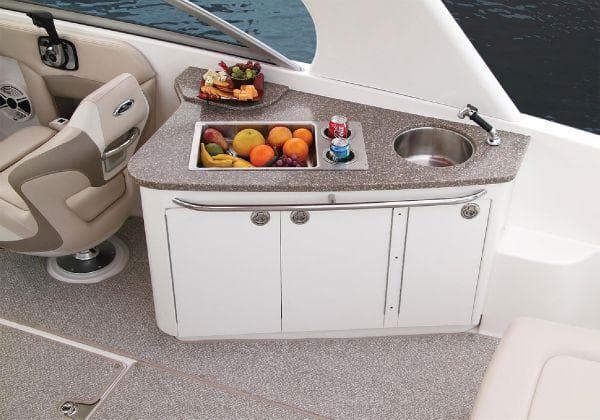 Luxury boat interior with fruit platter and sink, Chaparral 264 Sunesta 2012.