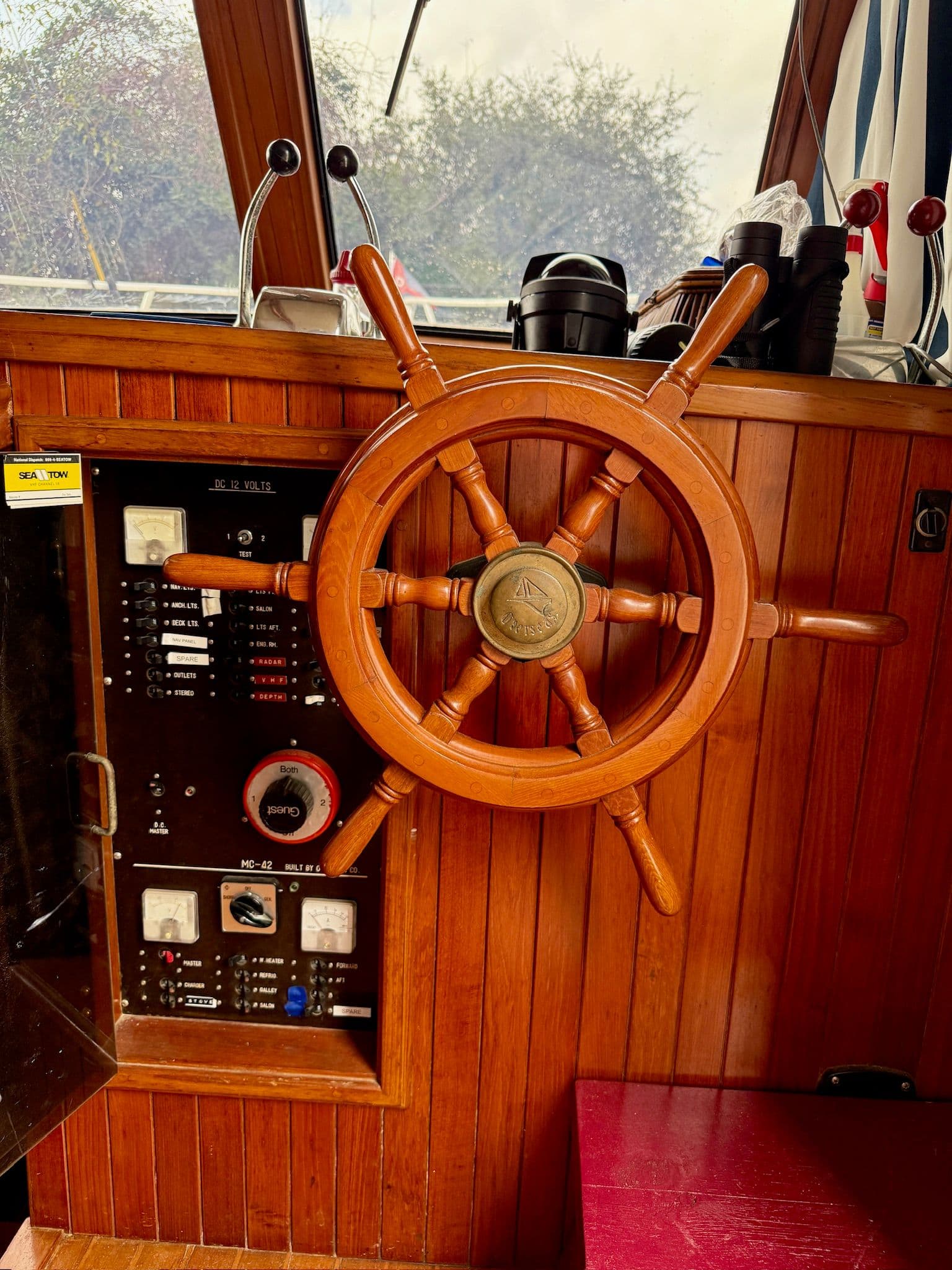Steering wheel and control panel of a 1988 PT 42 Yacht.