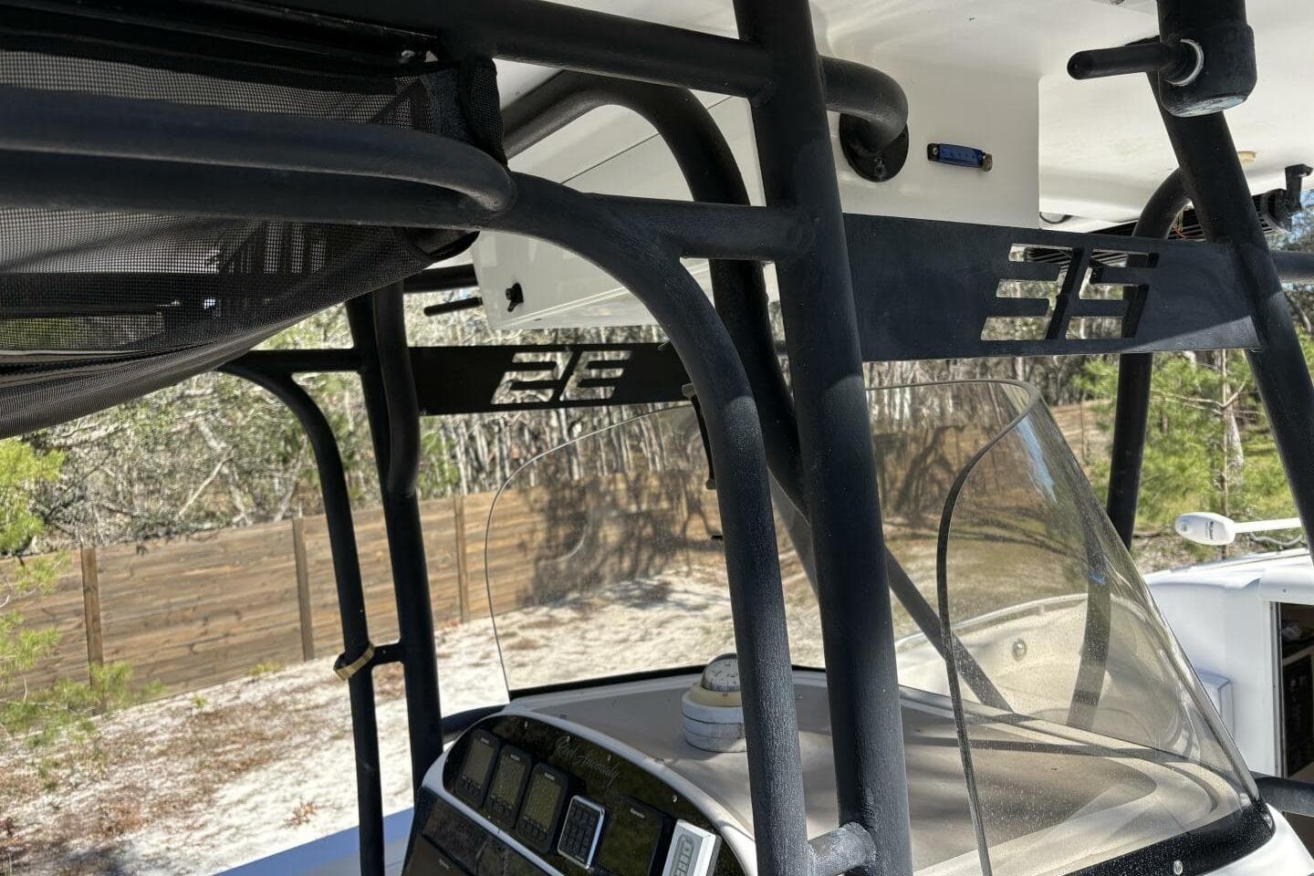 2008 Wellcraft 35 Scarab Sport boat interior with black framework and windshield.
