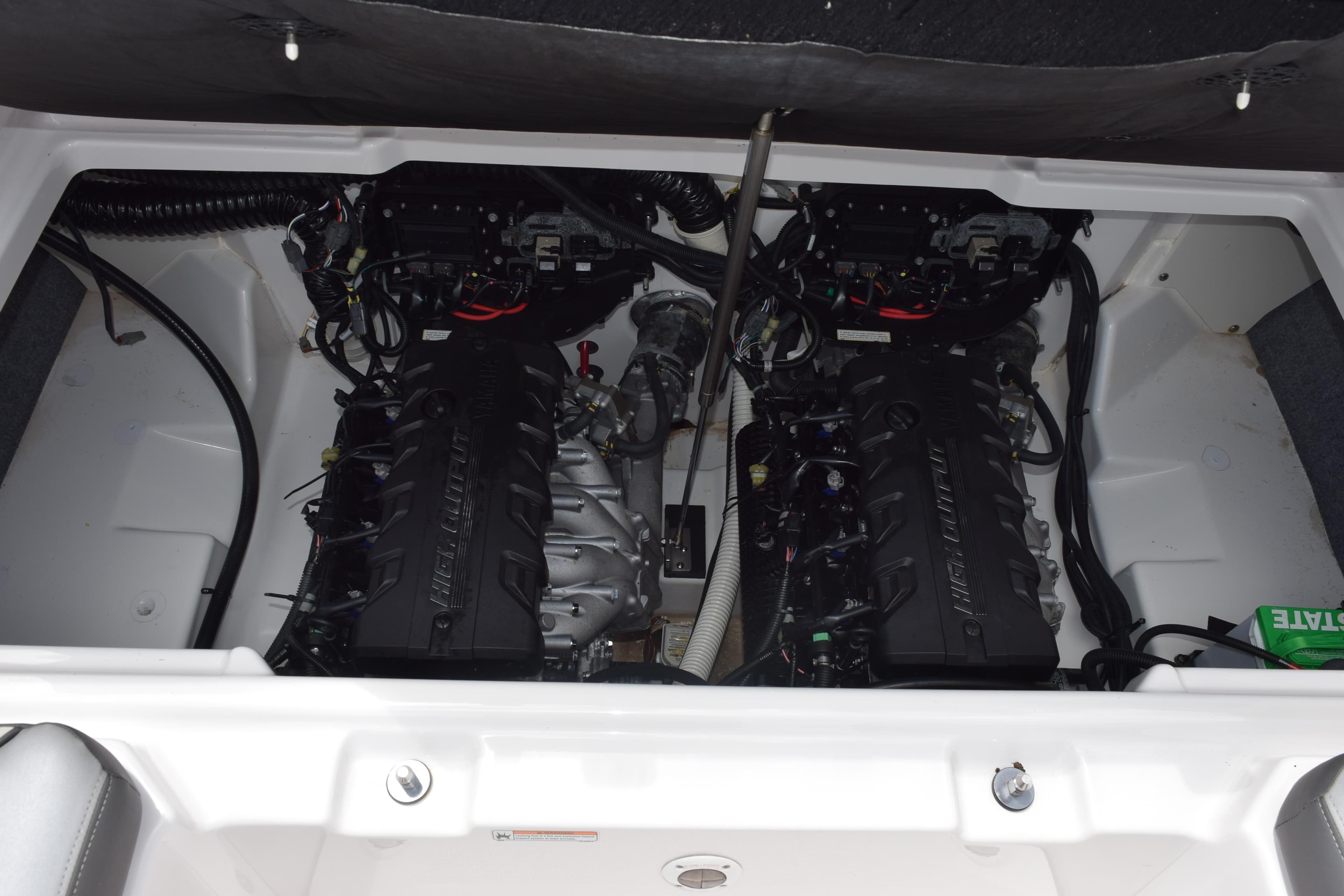 2023 Yamaha Boats AR250 engine compartment showcasing dual high-output engines.