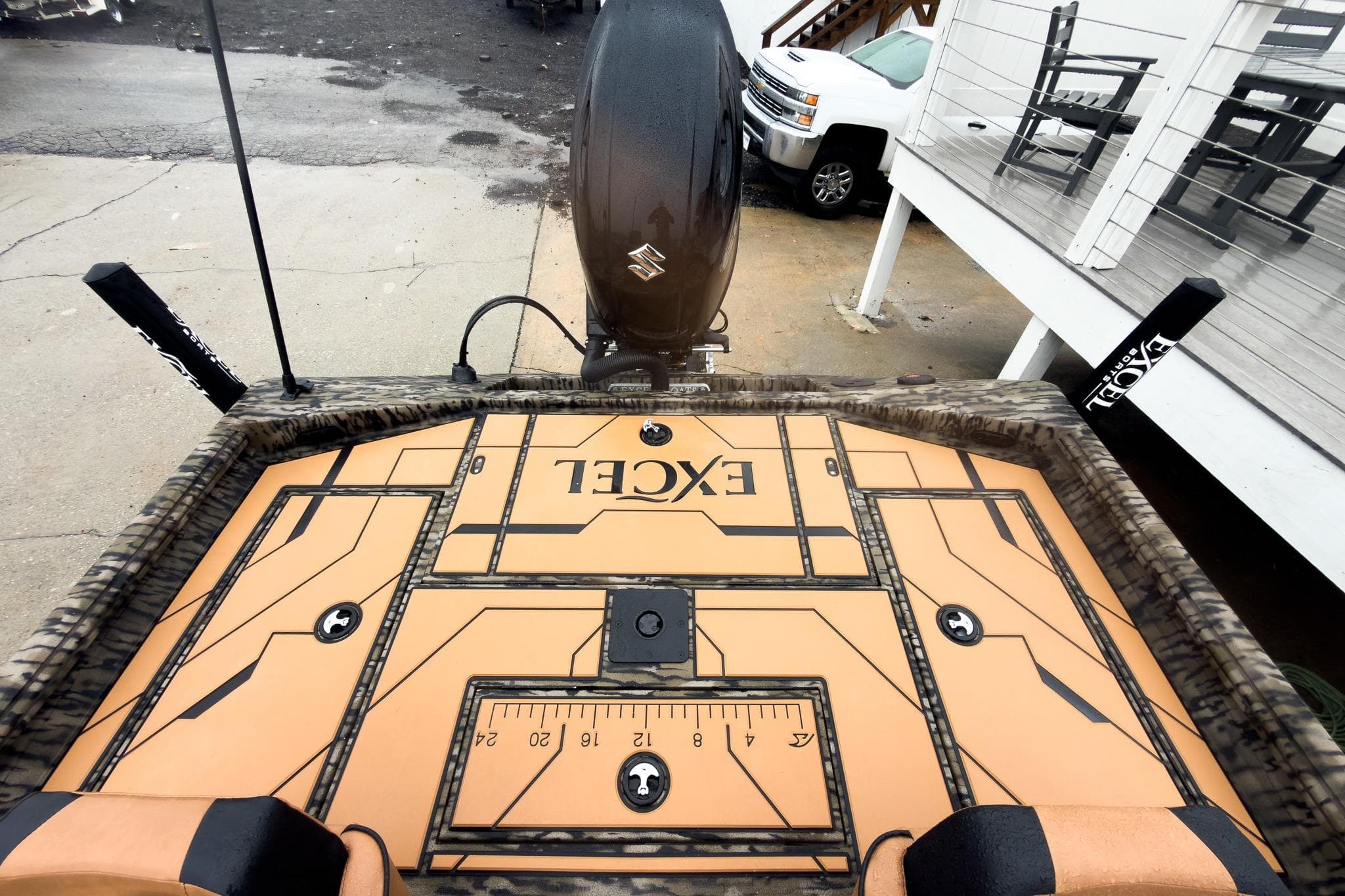 2026 Excel EX203C Crappie & Bass boat deck with measurement ruler and camo design.