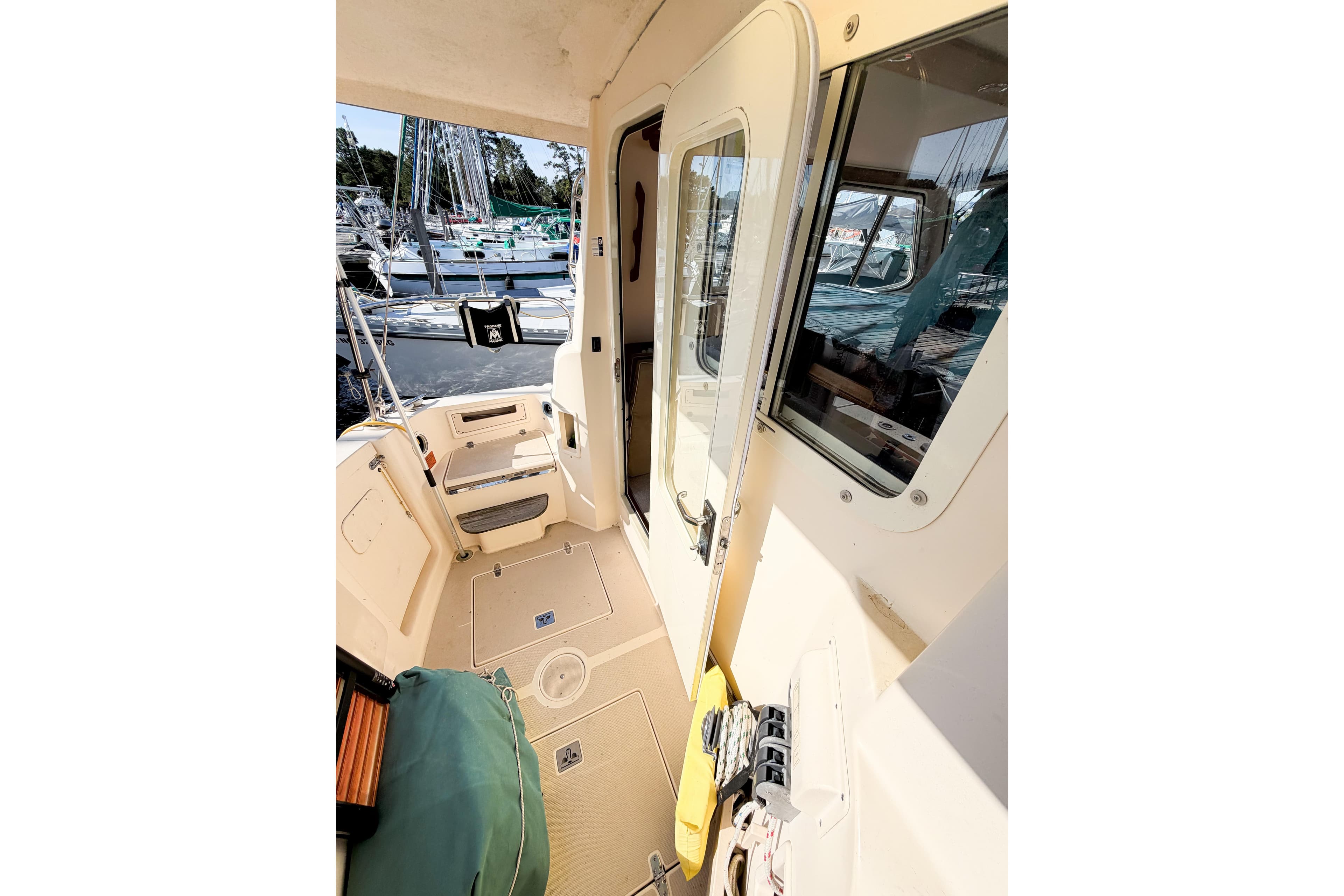 2007 Island Packet SP Cruiser cockpit with seating and marina view.