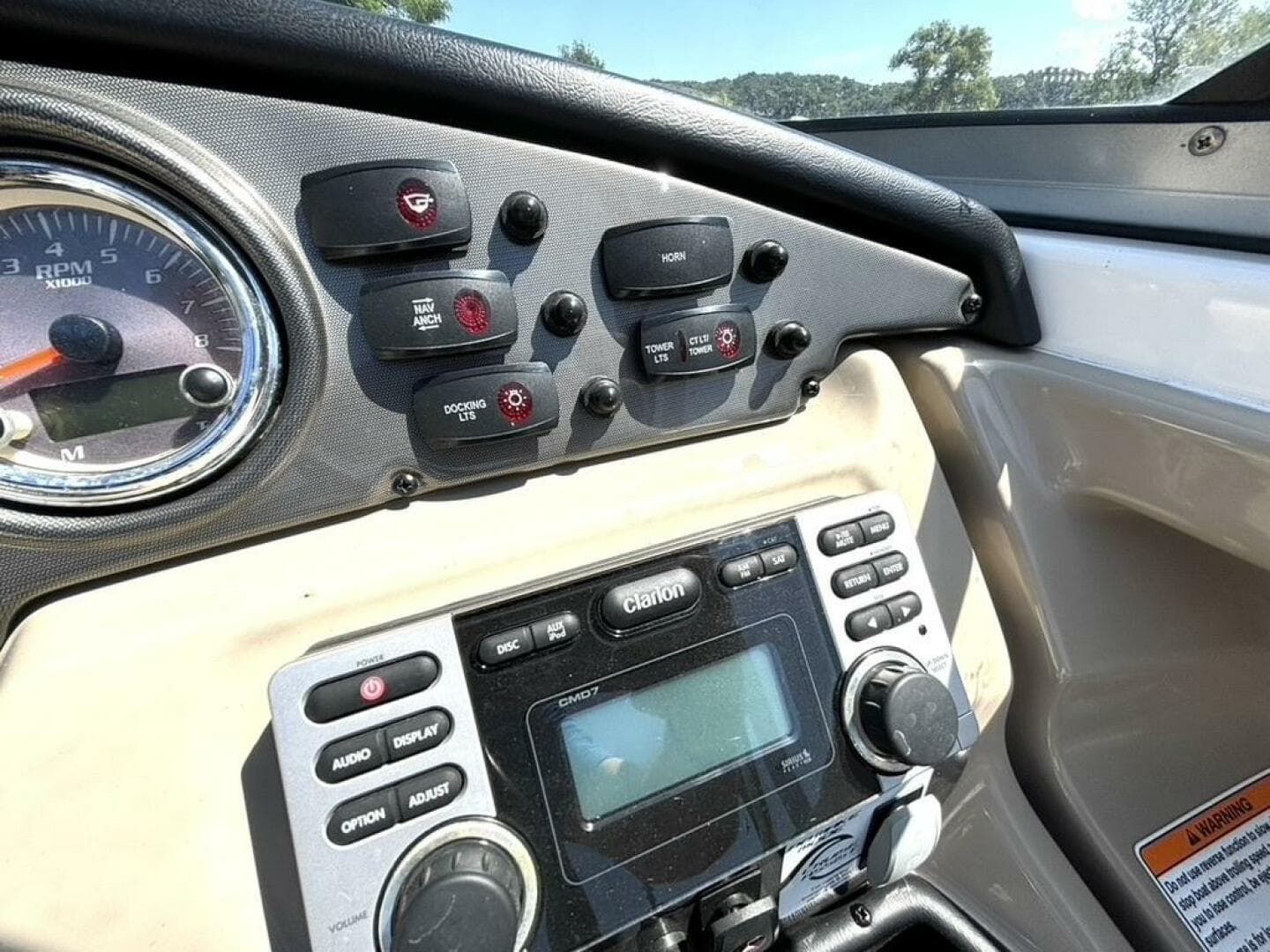 Dashboard of 2013 Yamaha Boats 242 Limited S with controls and gauges.