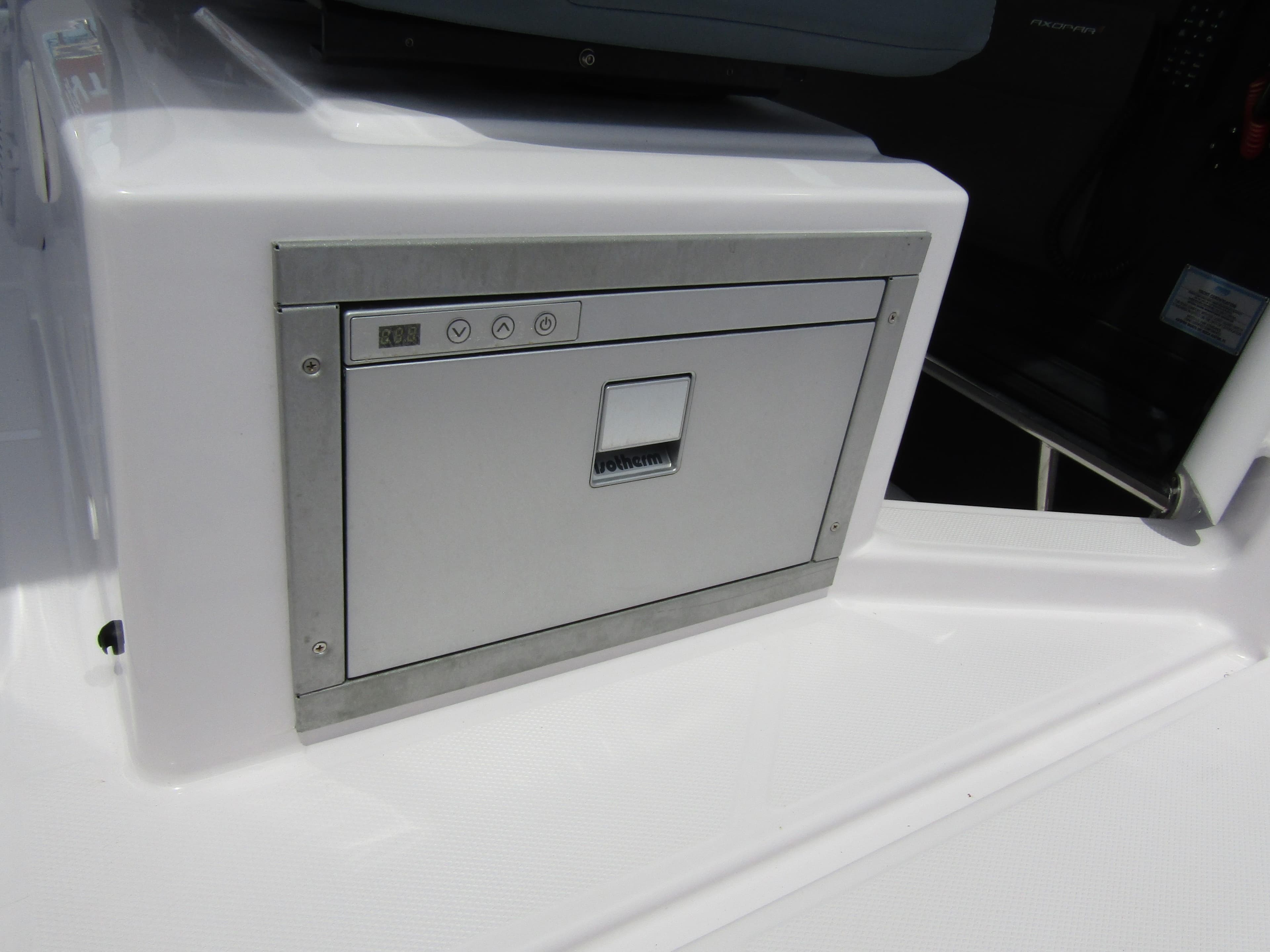 2024 Axopar 37 Sun Top boat, featuring a sleek built-in storage compartment.