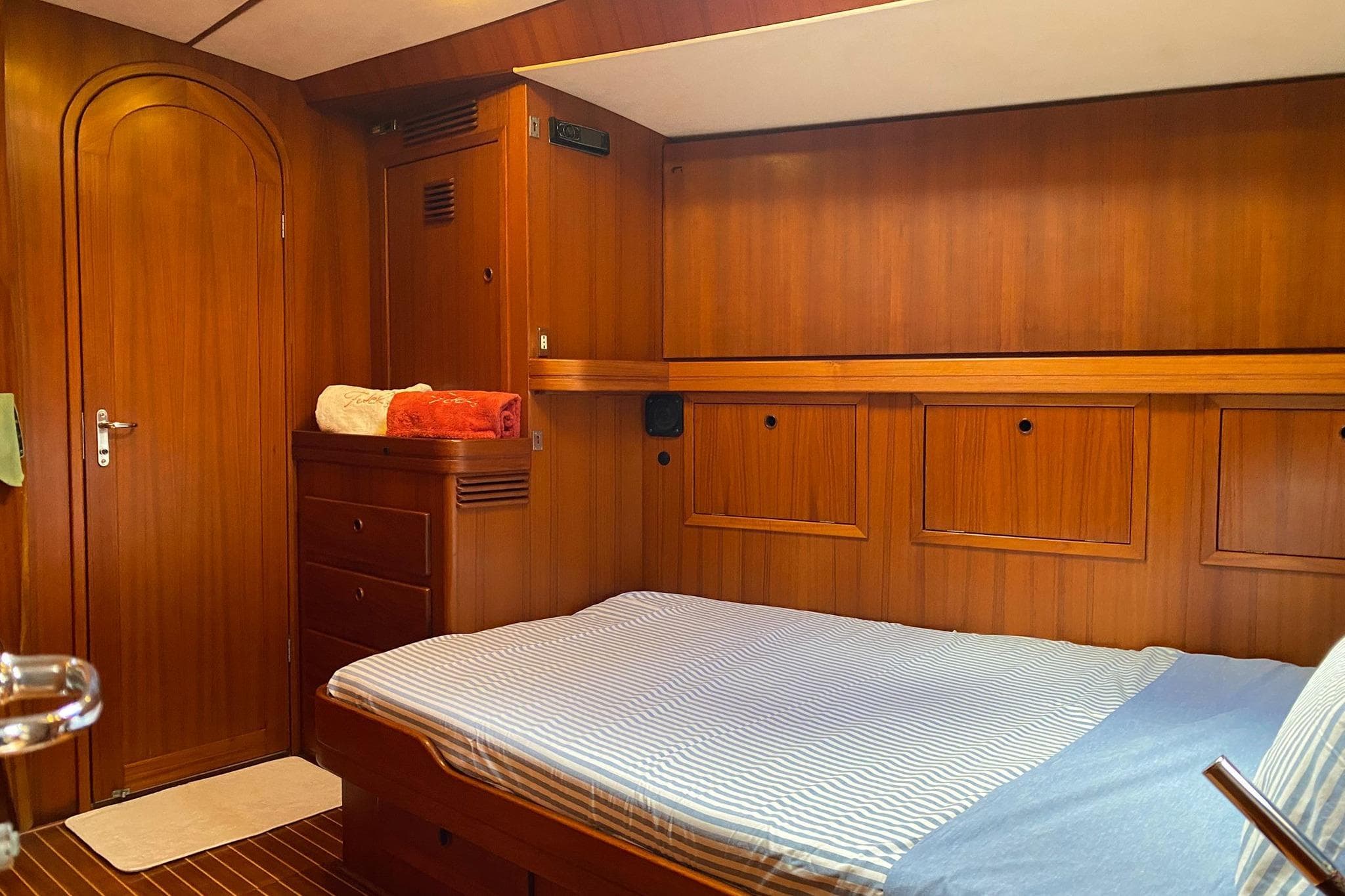 Luxurious wooden cabin interior of 1991 De Cesari Vallicelli 72 yacht.