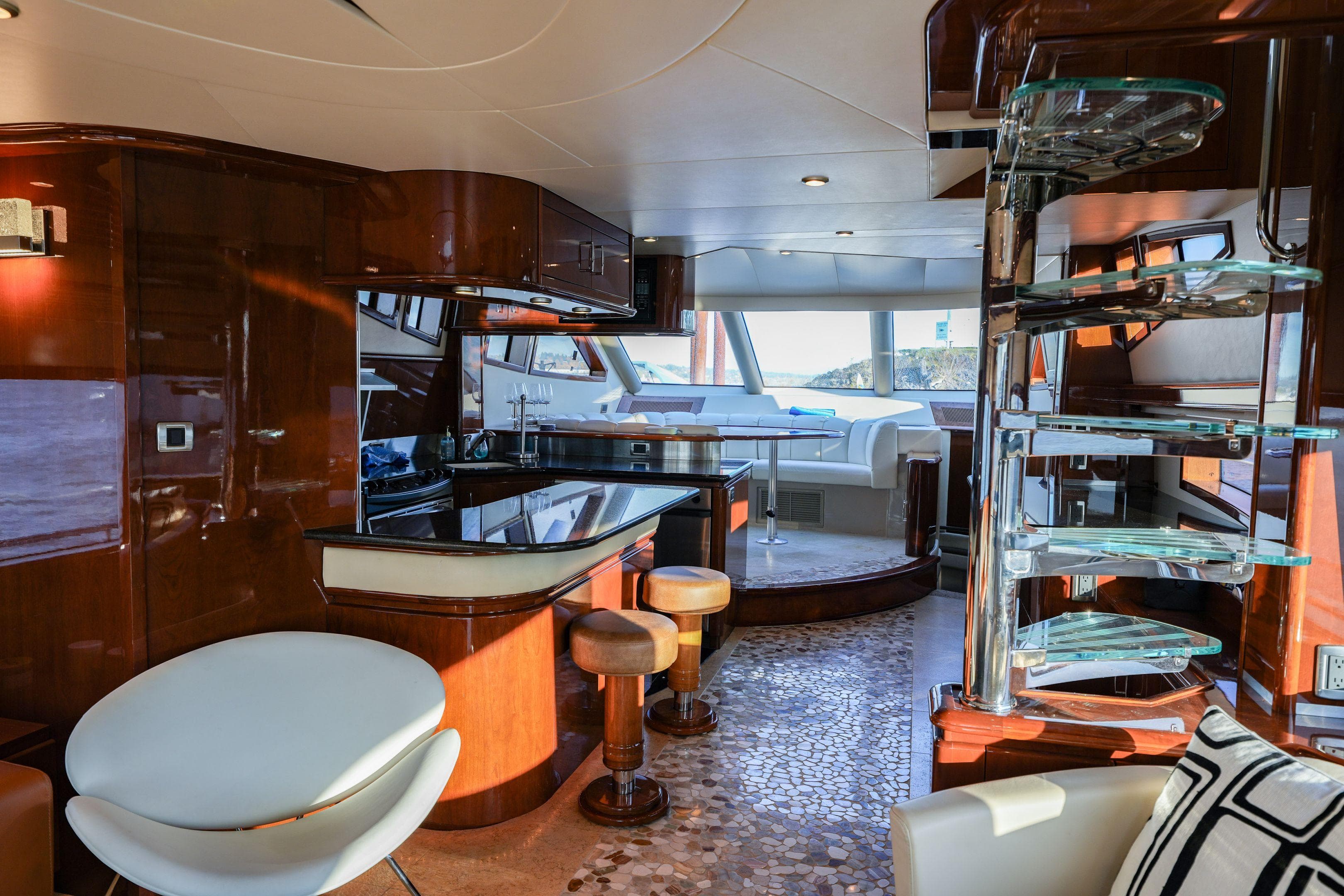 Luxurious interior of a 2006 Marquis 65 yacht with modern furnishings and elegant design.