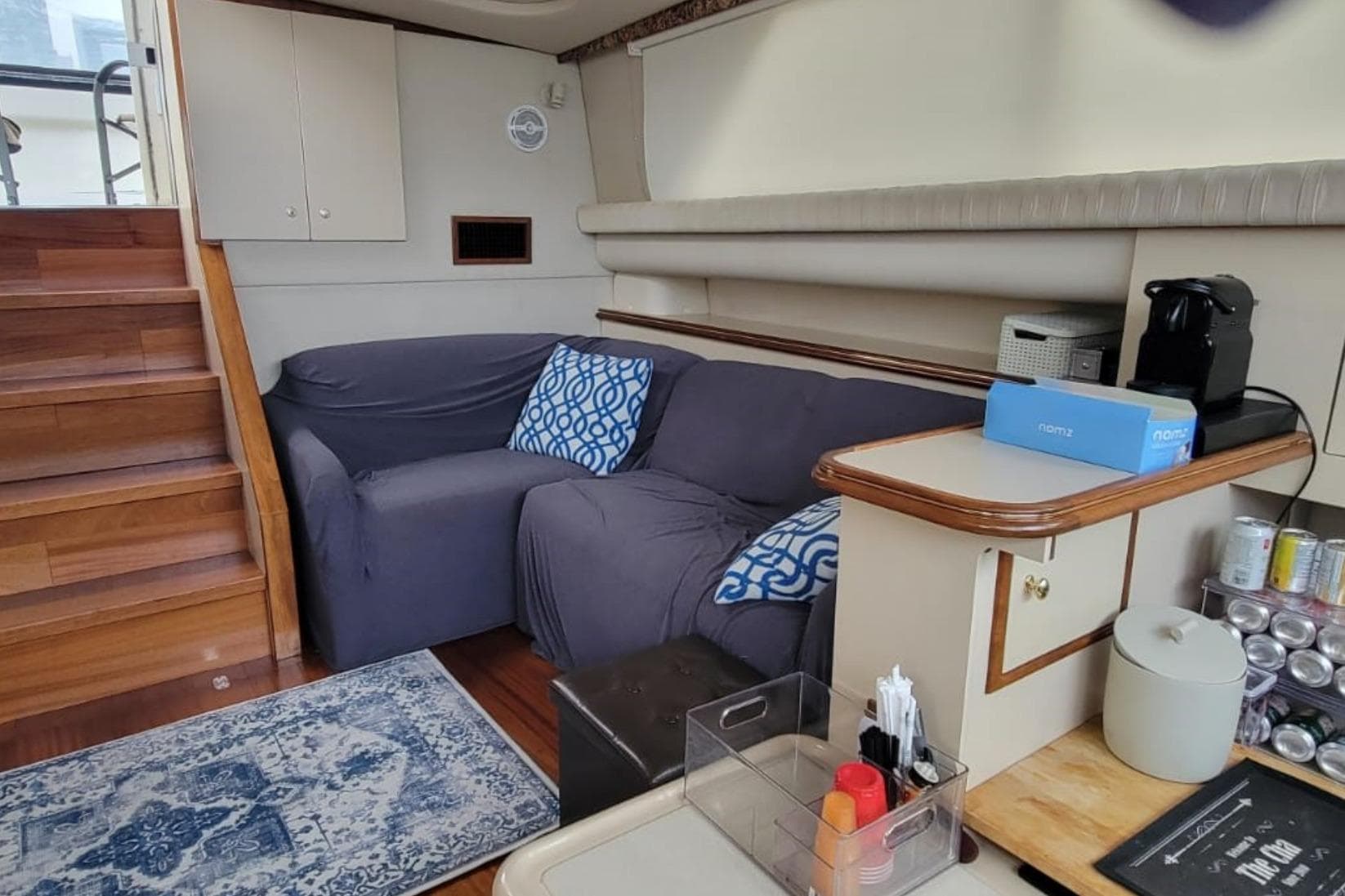 1999 Cruisers Yachts 3750 Motoryacht interior with cozy seating and coffee station.