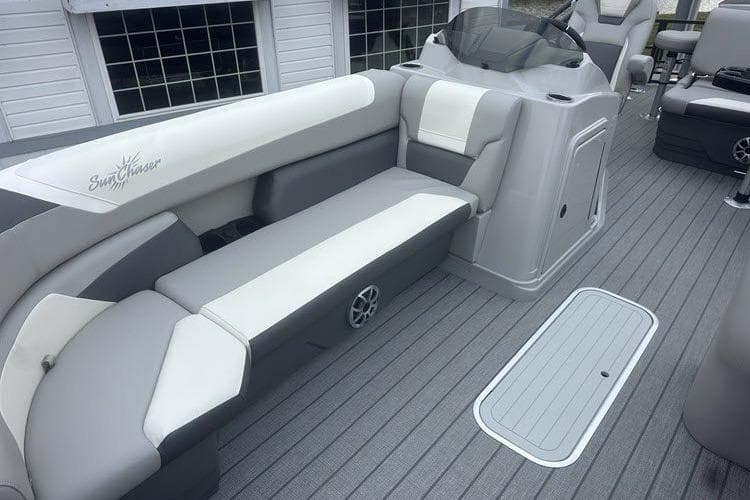 2026 SunChaser Eclipse 25 SBX DH BAR boat interior with gray seating and modern design.