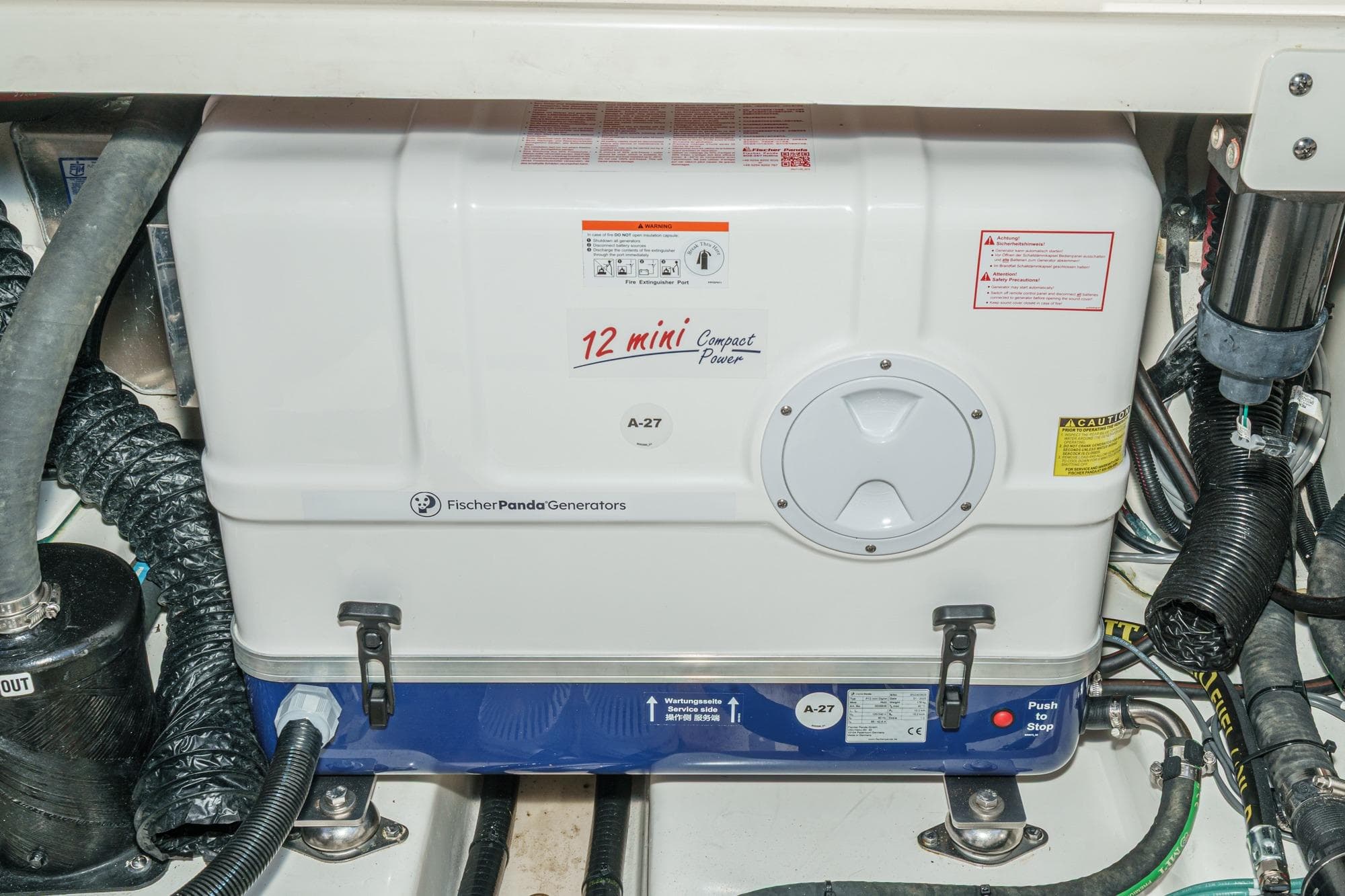 Engine room of 2024 Boston Whaler 380 Realm with Fischer Panda generator.