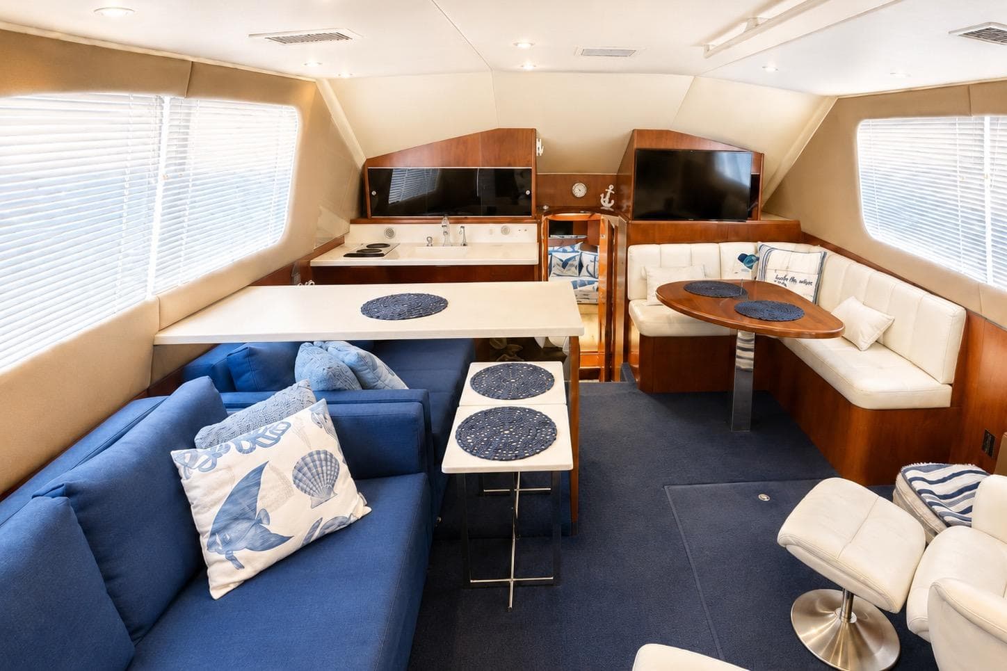 Luxurious interior of a 1995 Ocean Yachts 42 Super Sport with elegant seating and decor.