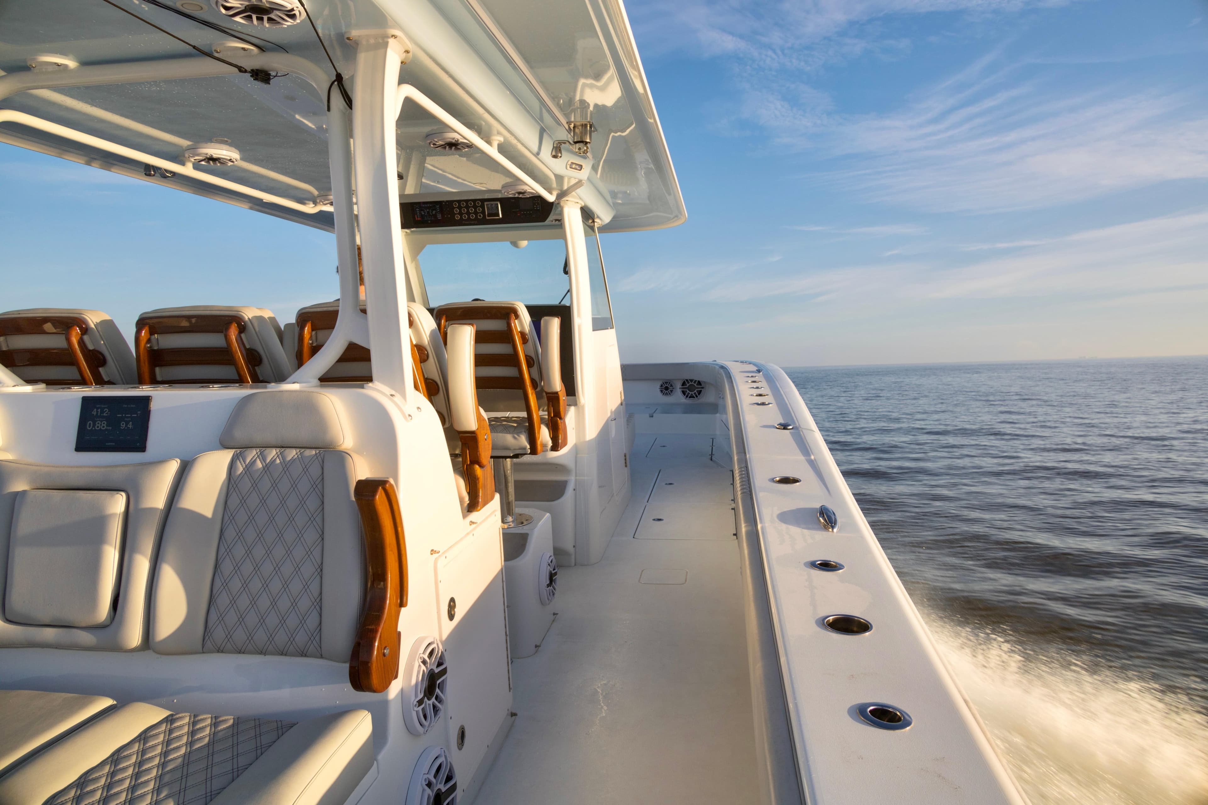 Luxurious 2021 Freeman 47 boat interior cruising on open water under clear skies.