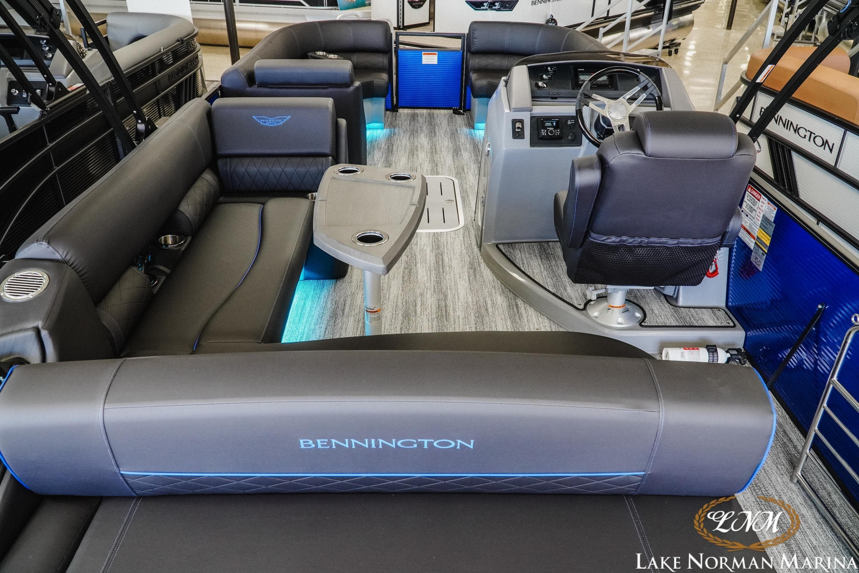 2026 Bennington 23LSB pontoon boat interior with luxurious seating and modern helm.