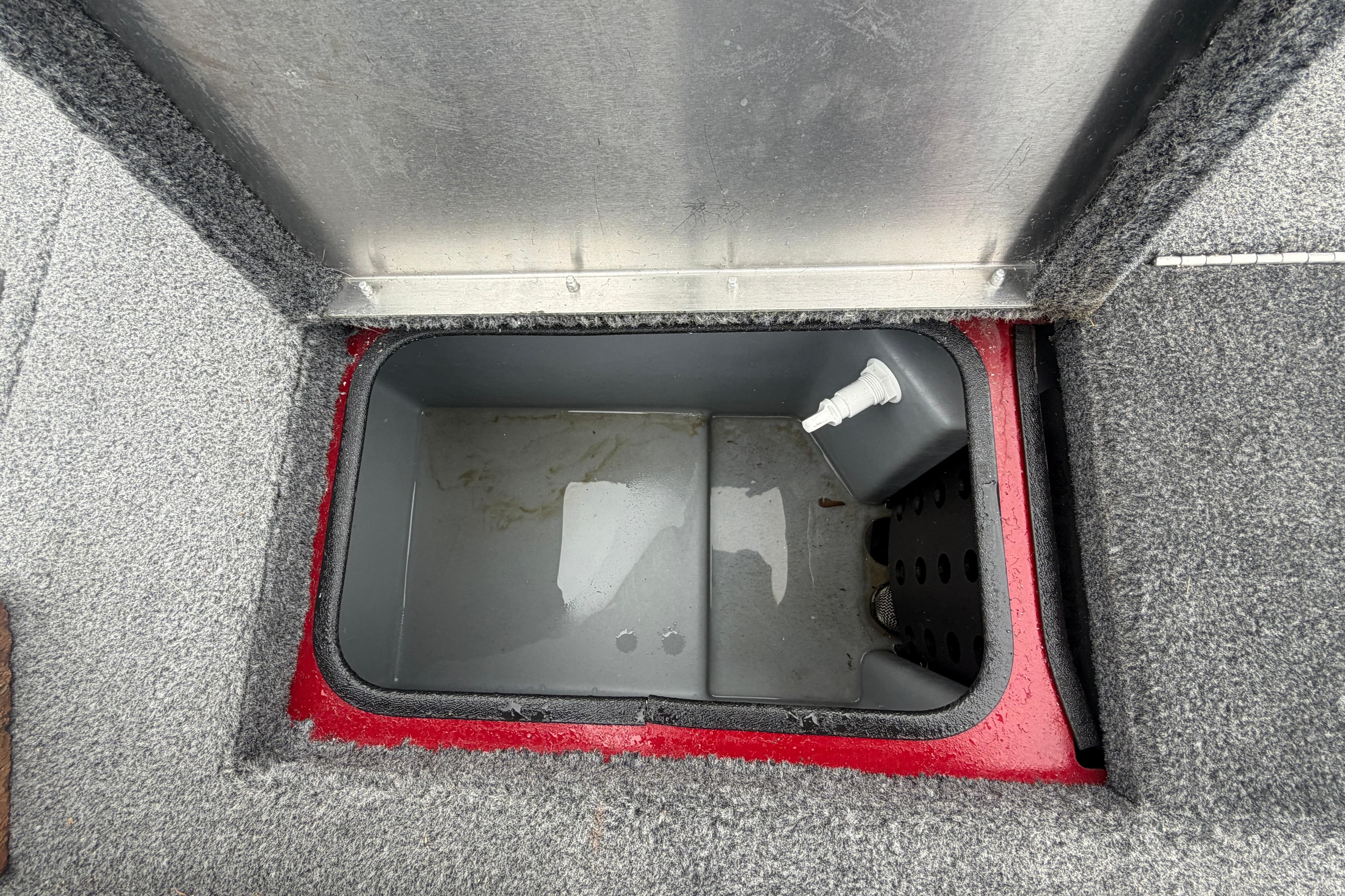 Open storage compartment in 2021 Tracker Pro Team 195 TXW boat.