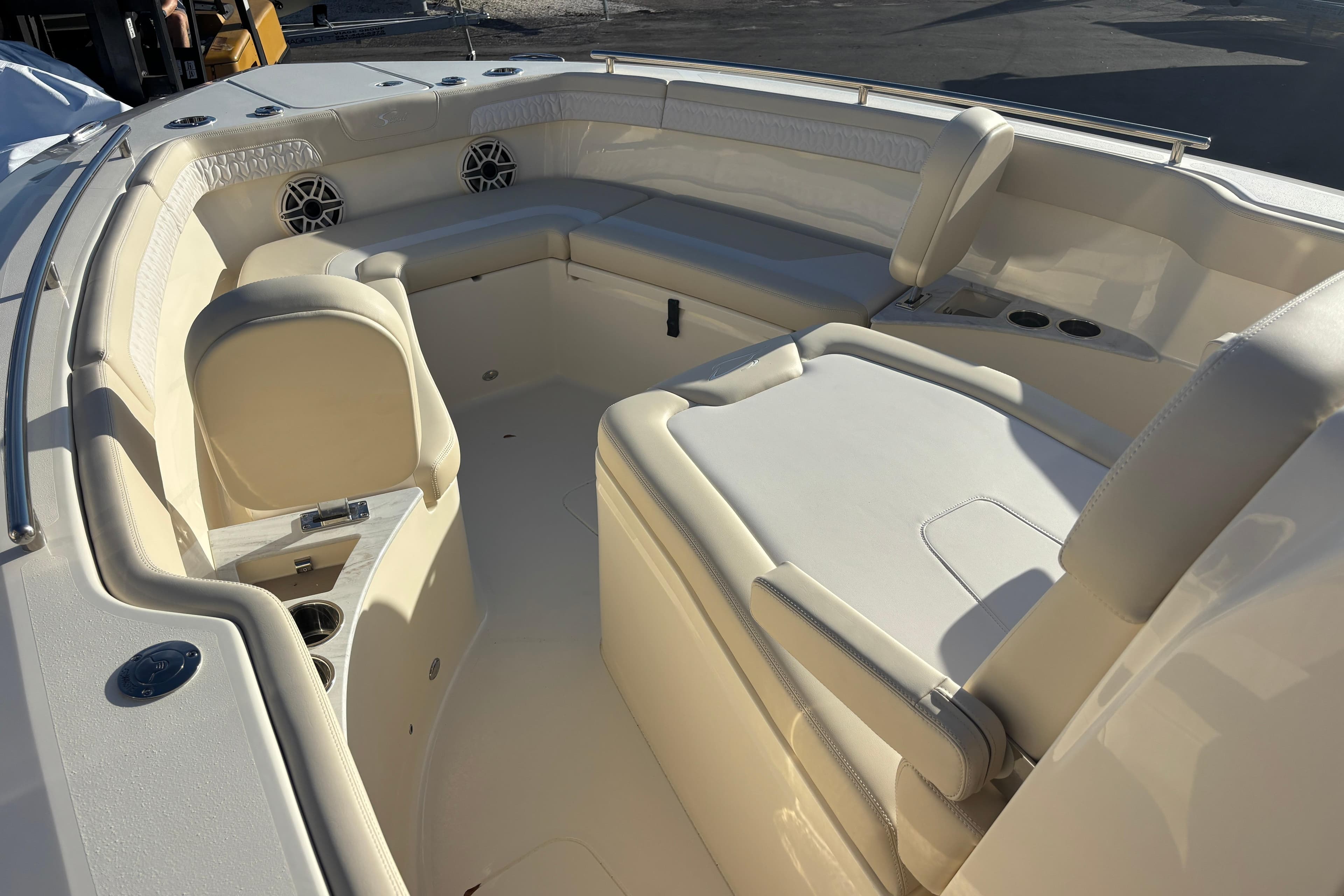 2026 Scout 260 LXF boat interior with luxurious seating and cup holders.