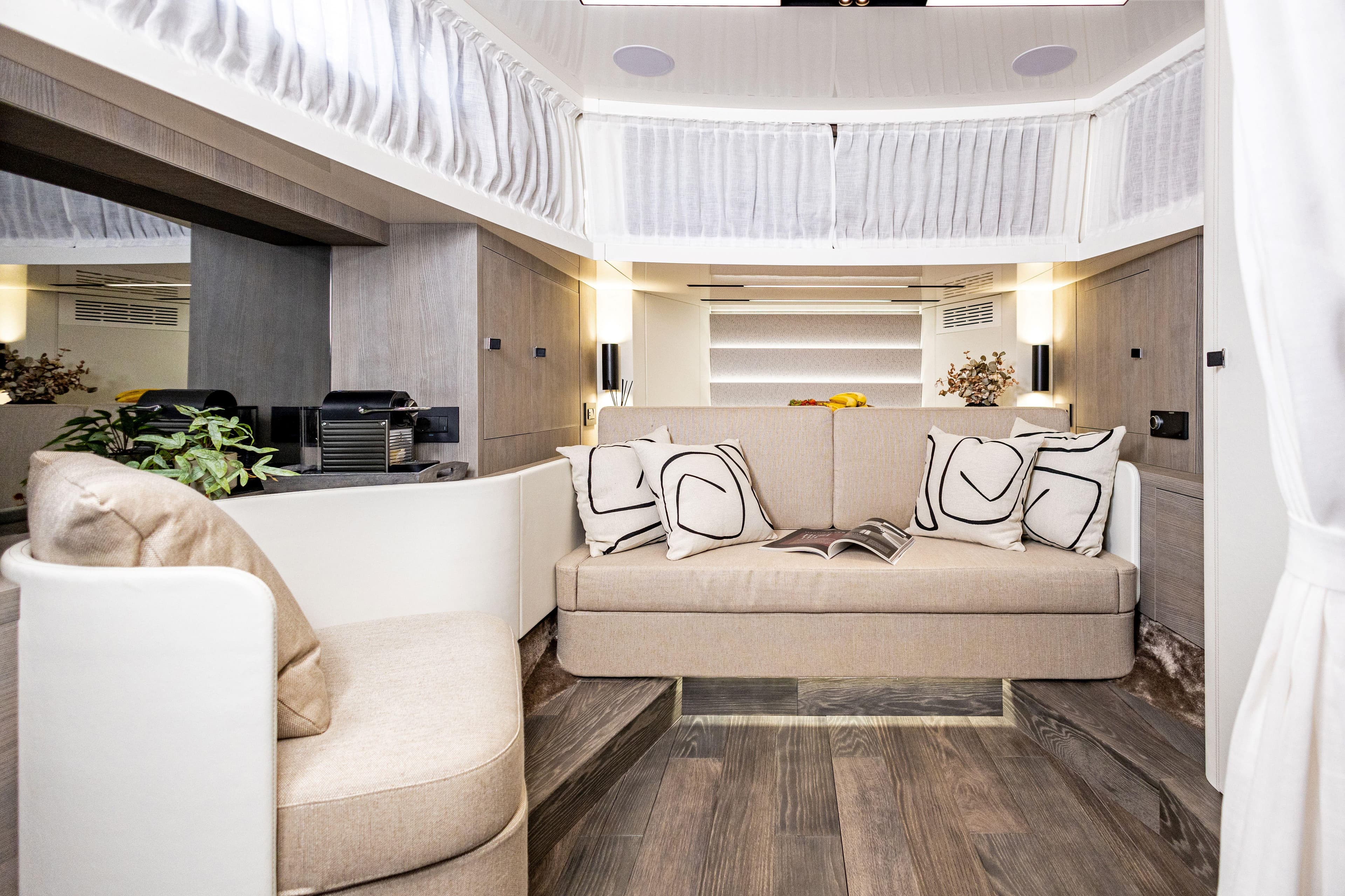 Luxurious interior of 2024 Cranchi A 46 yacht with elegant seating and modern decor.