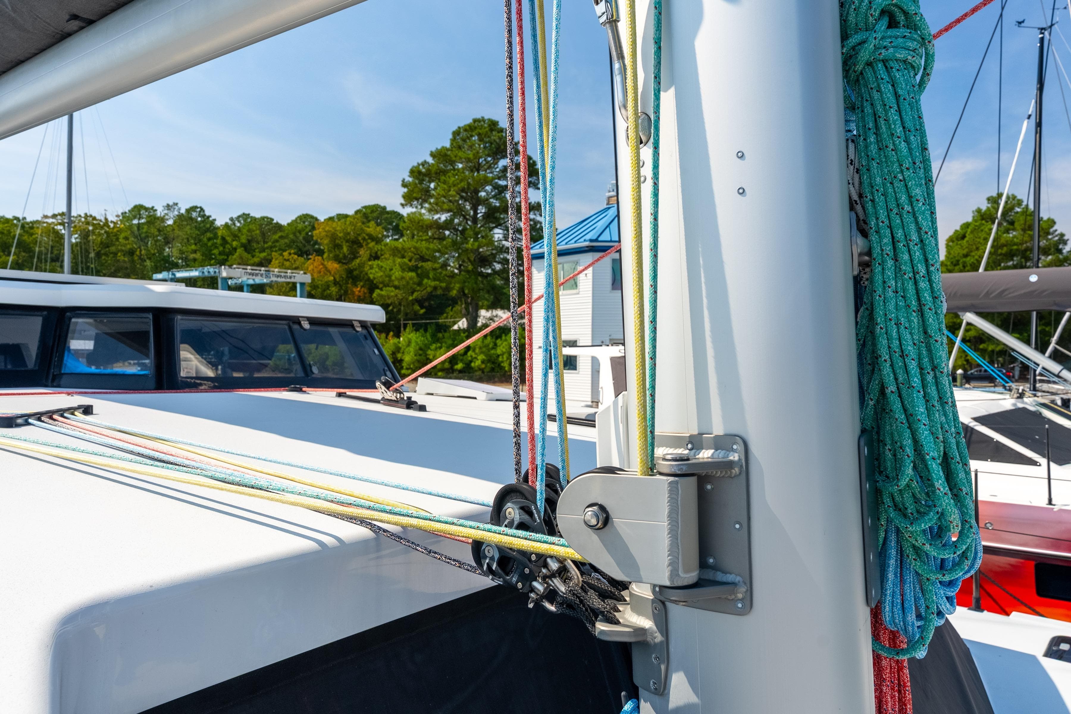 Sailboat rigging on a 2024 St Francis 460, featuring colorful ropes and mast details.