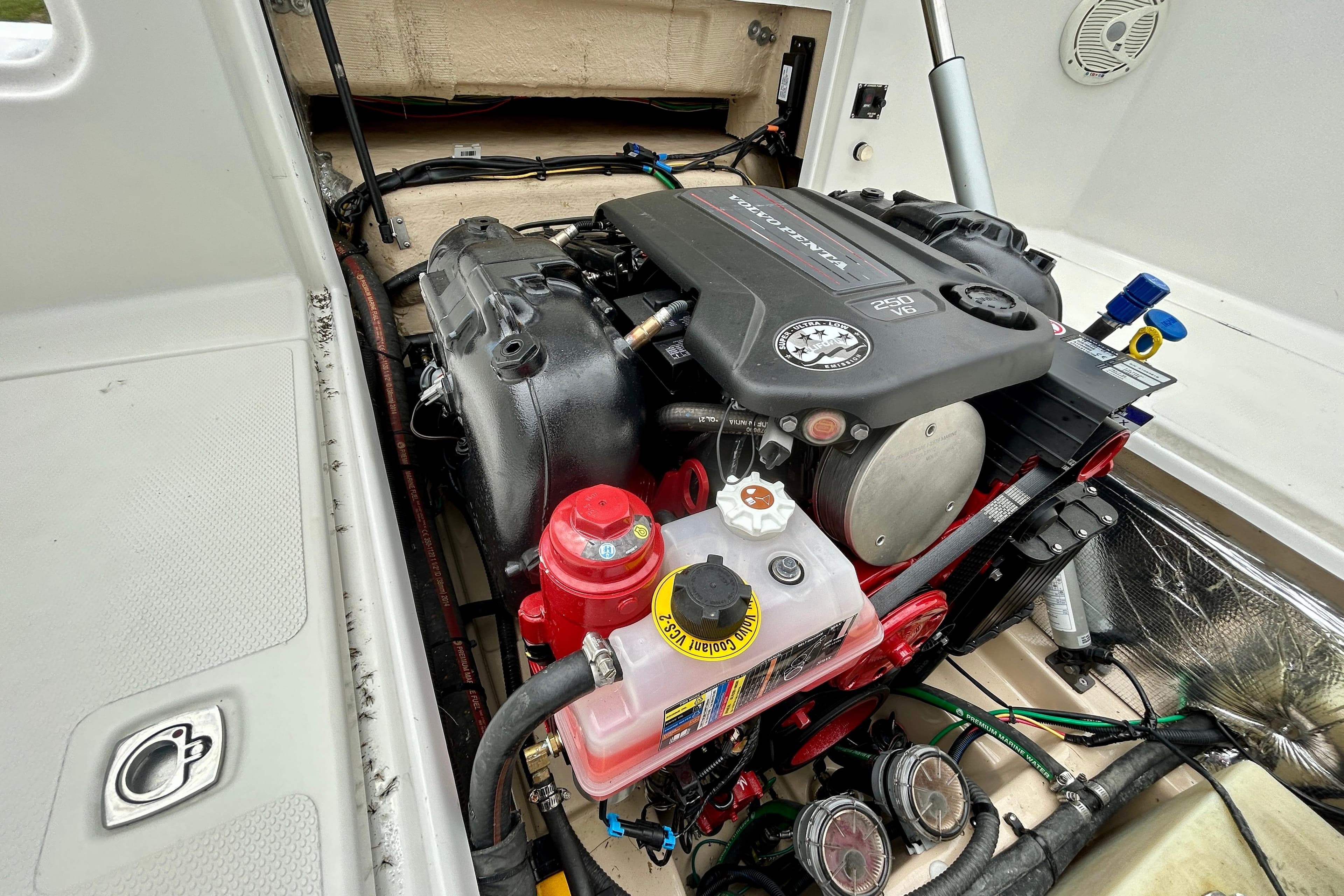 Engine compartment of a 2016 Cutwater C-24 boat, featuring a Volvo Penta engine.