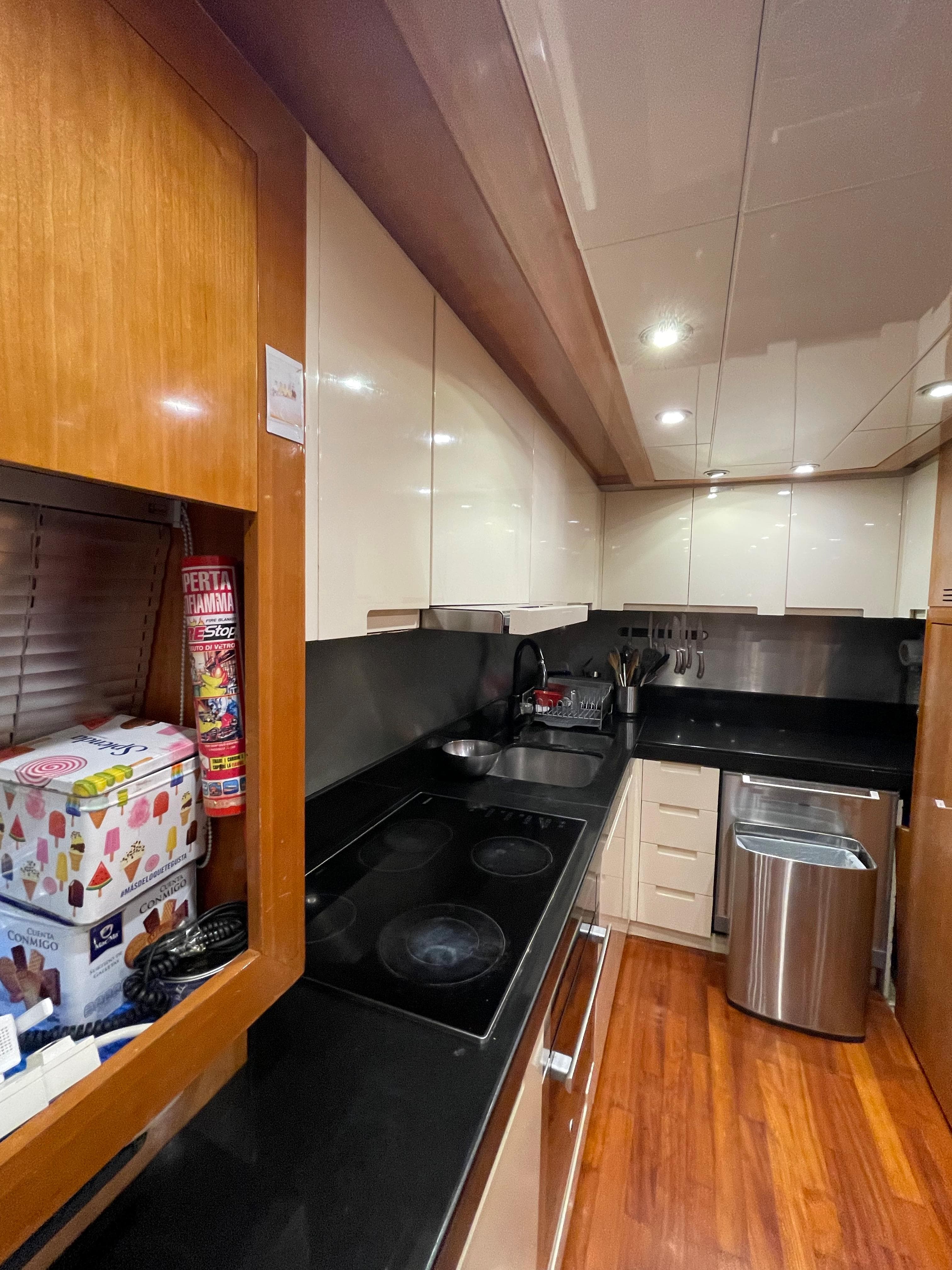 Modern kitchen in 2007 Posillipo Technema 95 yacht.