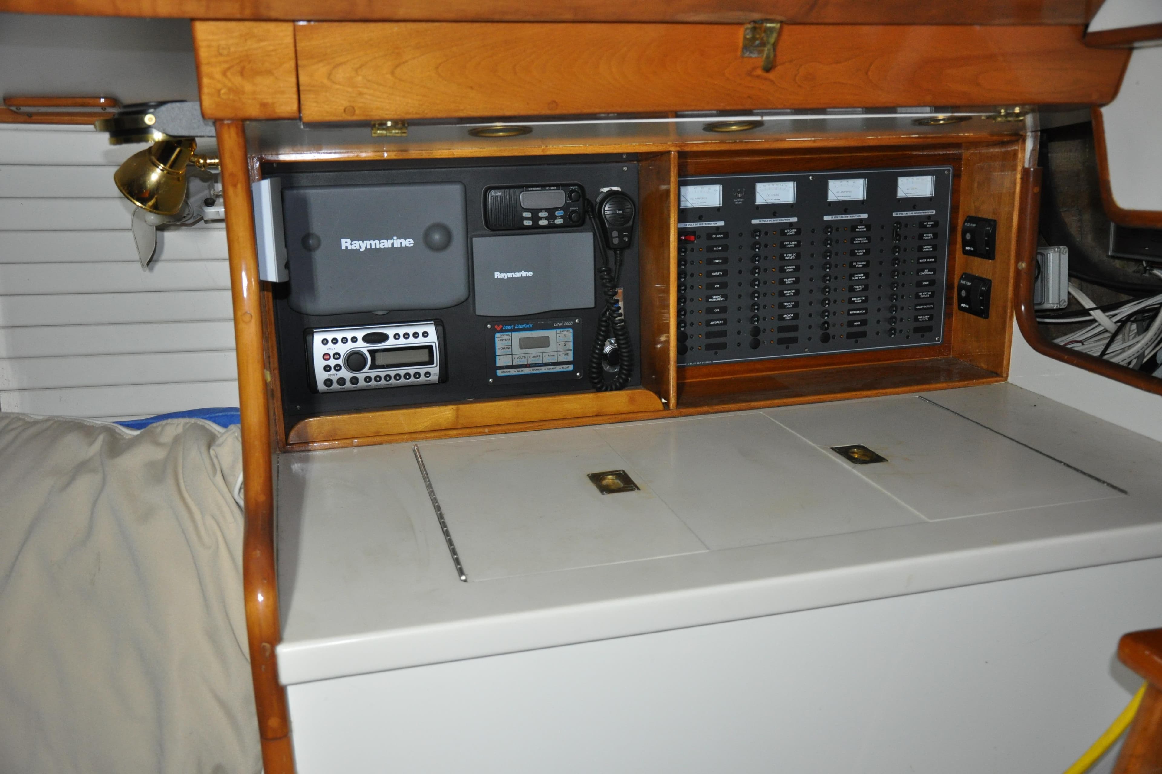 Navigation equipment and control panel inside a 1970 Hinckley Bermuda 40 sailboat cabin.