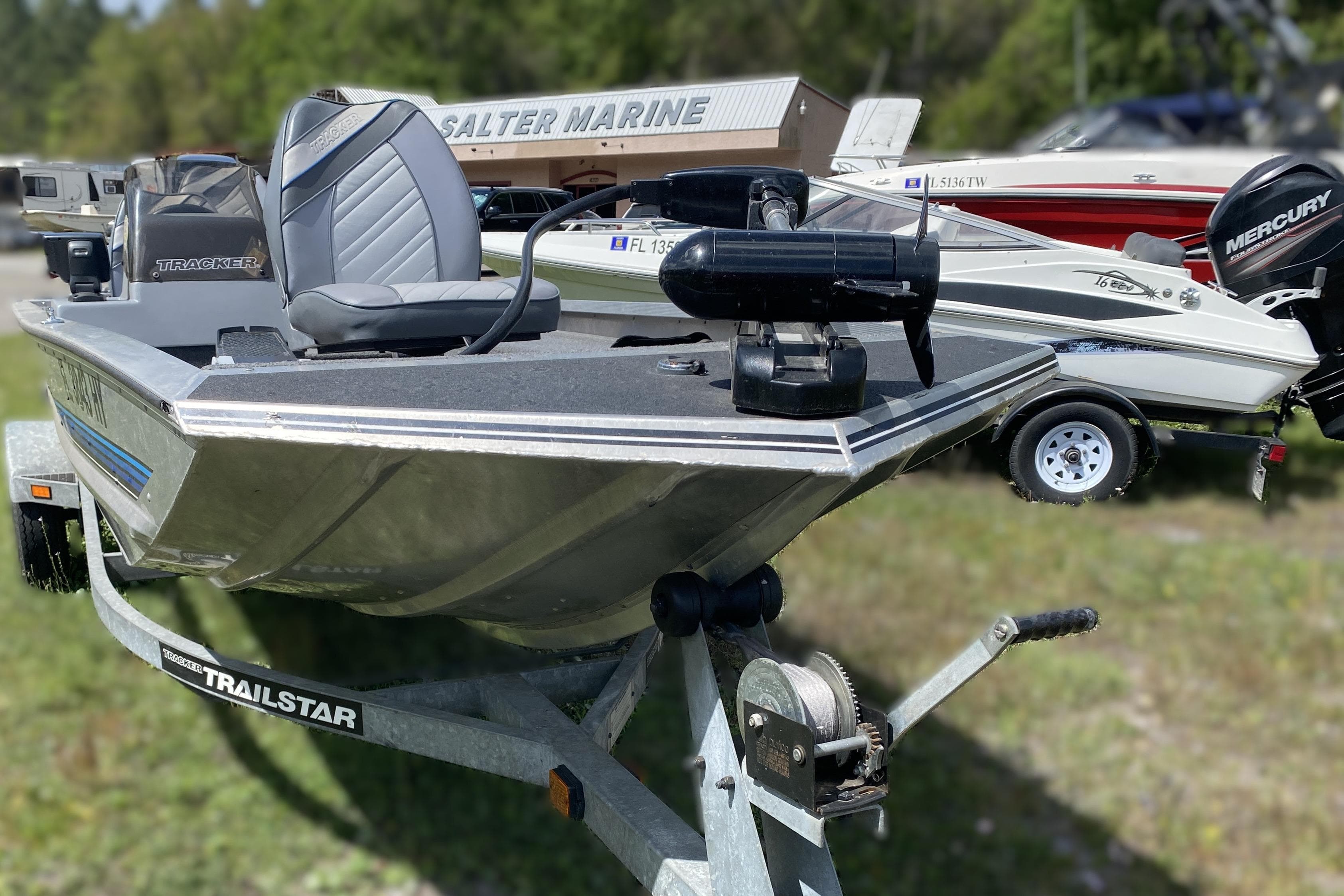 1994 Tracker Pro Guide V-17 SC boat on trailer, featuring a Mercury engine.