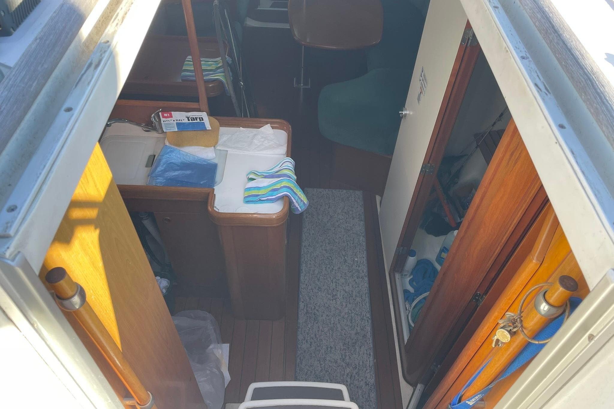 Interior view of 2000 Beneteau Oceanis 361 sailboat, featuring cabin and storage areas.