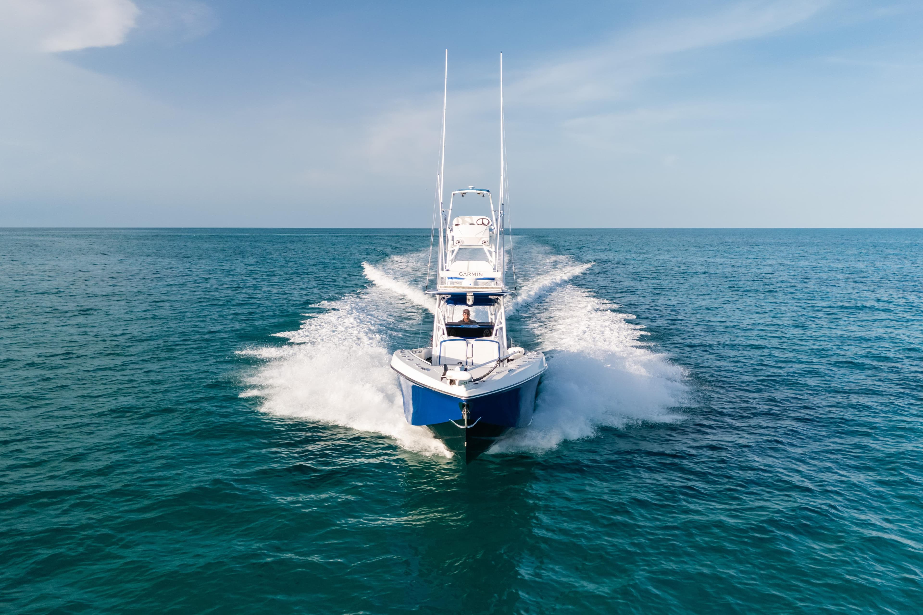 2022 Nor-Tech 392 Super Fish cruising on open ocean waters.